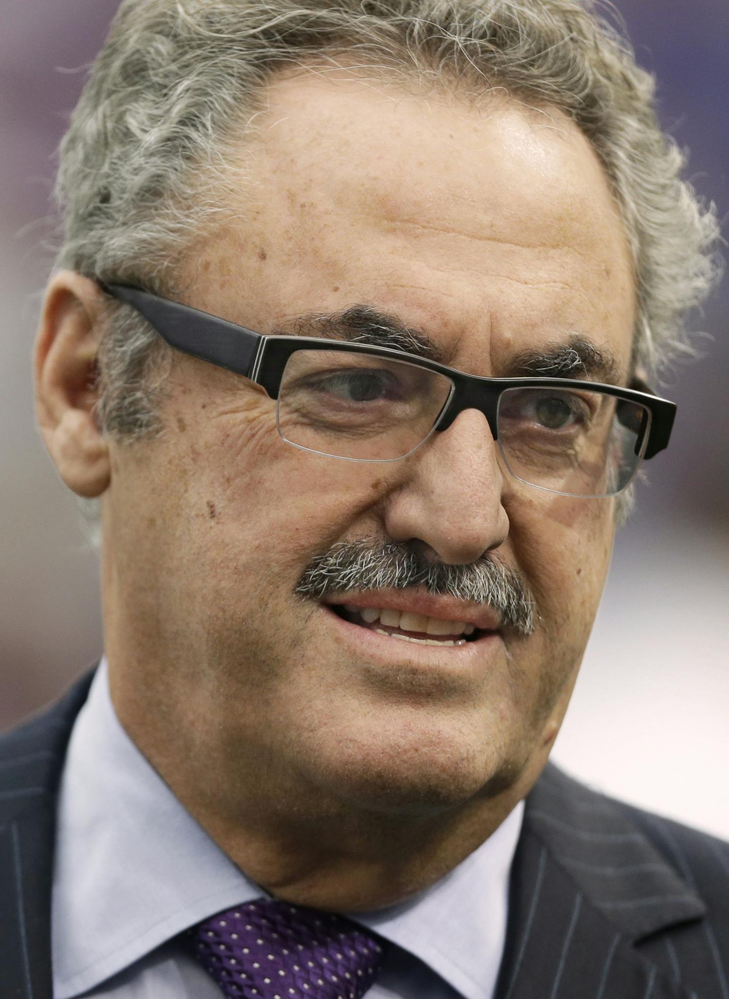 Minnesota Vikings owner Zygi Wilf waits on the field before an NFL football game between the Vikings and the Cleveland Browns Sunday, Sept. 22, 2013, in Minneapolis. (AP Photo/Charlie Neibergall) ORG XMIT: MIN2013092614562874 ORG XMIT: MIN1309261514543805