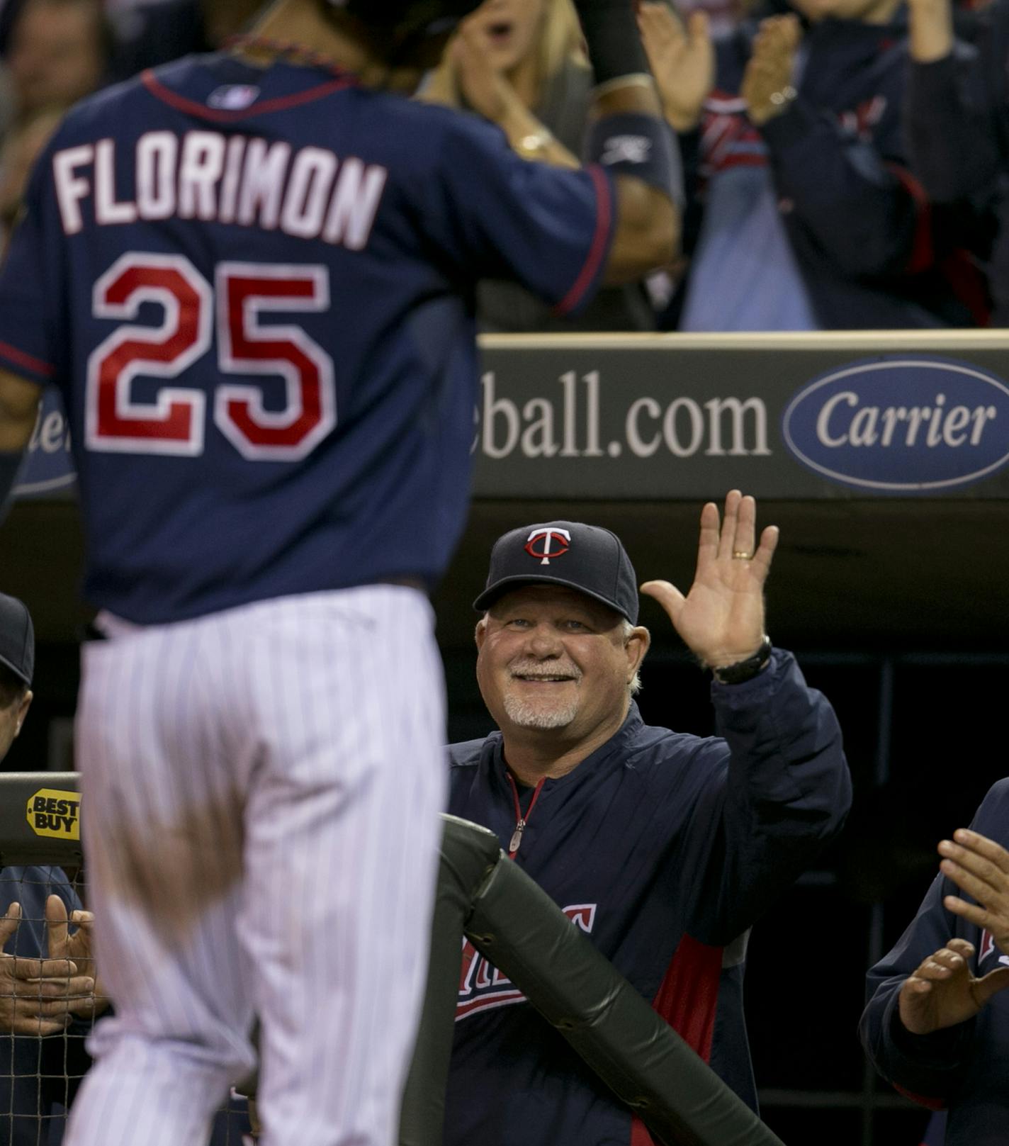 The Minnesota Twins lost 6-3 to the New York Yankees in the first game of their three day series Monday night, September 24, 2012 at Target Field in Minneapolis, Minn. Pedro Florimon was welcomed to the dugout by manager Ron Gardenhire, center, and Scott Ullger, right, after hitting a home run off Cory Wade in the eighth inning. ] JEFF WHEELER &#x201a;&#xc4;&#xa2; jeff.wheeler@startribune.com