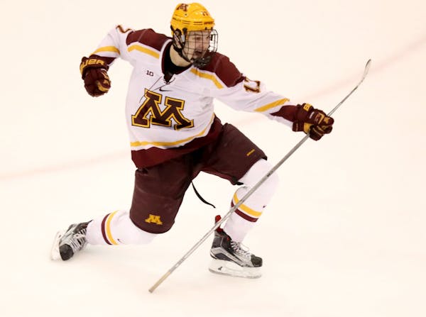 The University of Minnesota's Tommy Novak's celebrates his second goal of the game during the third perid of the Gophers 5-5 tie with the University o