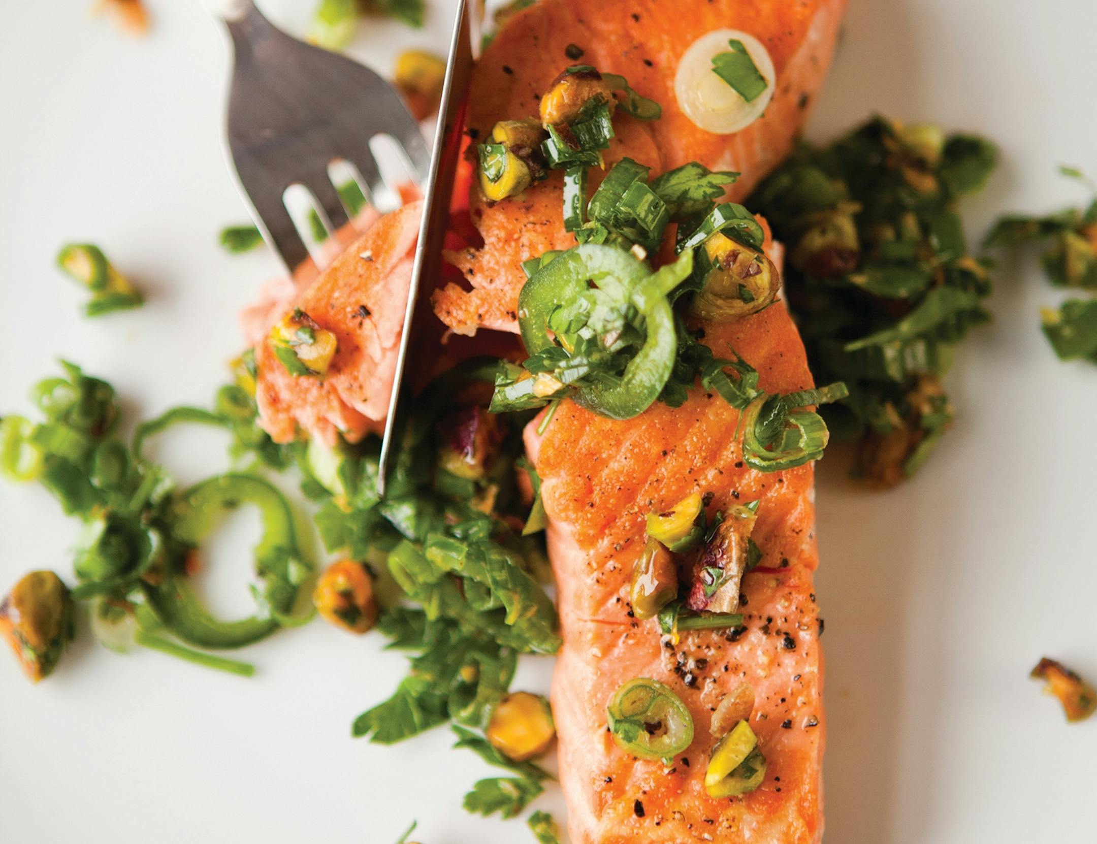 Pan-Seared Salmon With Pistachio-Herb Gremolata. Serves 4. From "A Mouthful of Stars," by Kim Sunée.