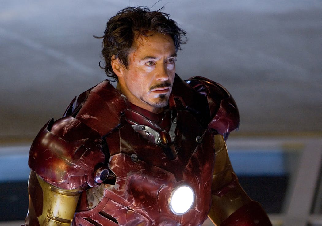 Tony Stark (Robert Downey Jr.) in his battle-scarred Mark III armor in “Iron Man.”