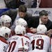 Phoenix Coyotes coach Dave Tippett talks to his team during a timeout in the third period in Game 1 of a first-round NHL hockey playoff series against