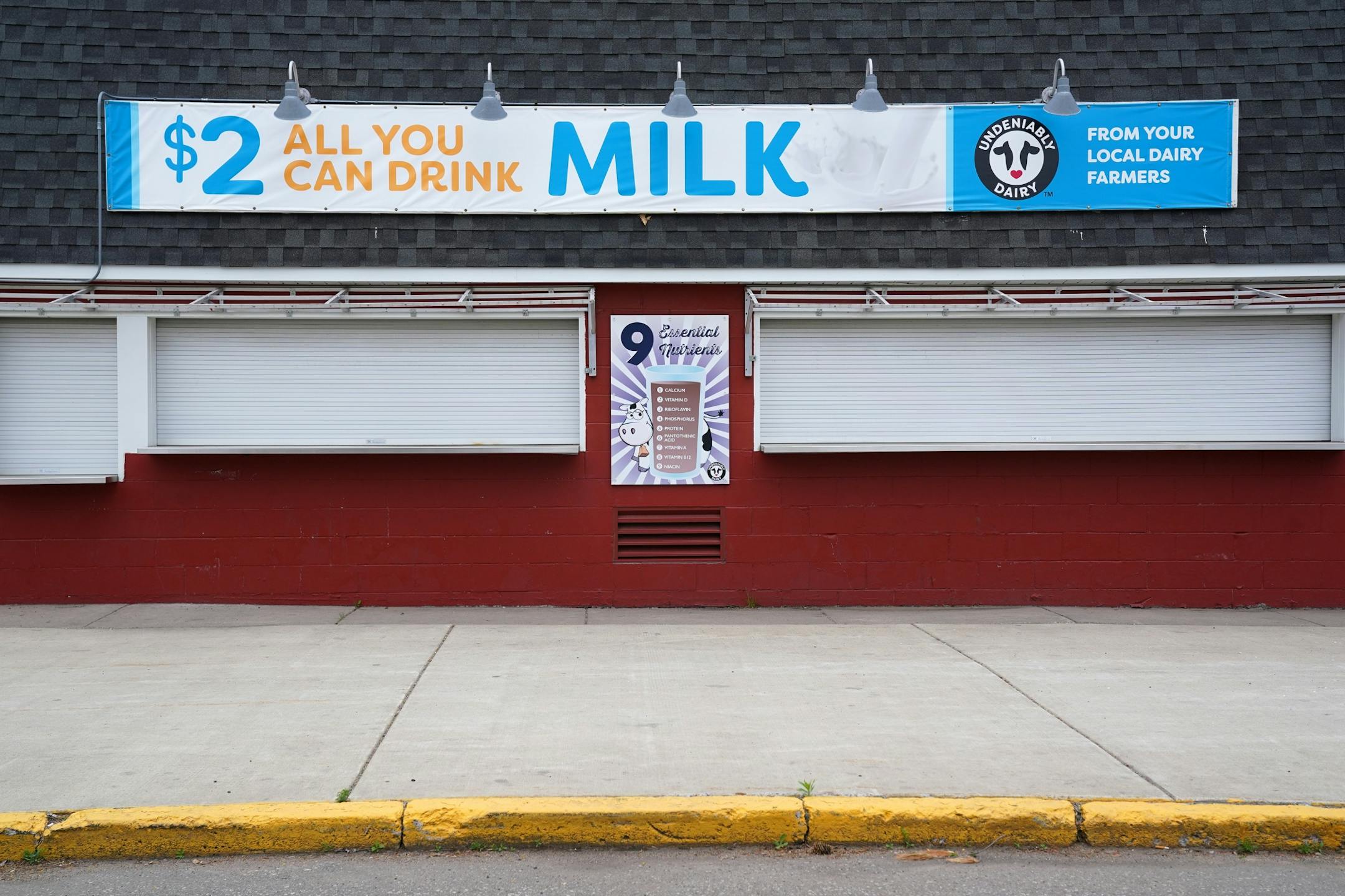 The All You Can Drink Milk stand sat shuttered Thursday.