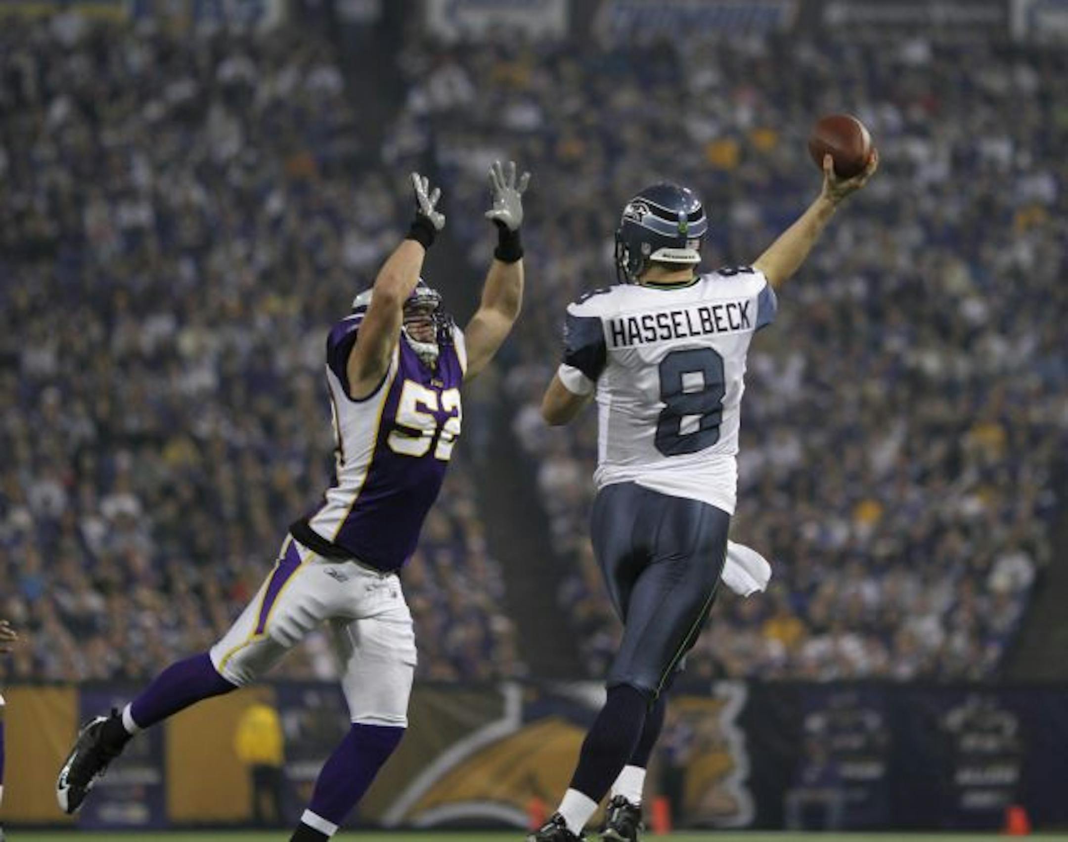 The Vikings' Chad Greenway rushed Seattle quarterback Matt Hasselbeck in the first quarter Sunday.