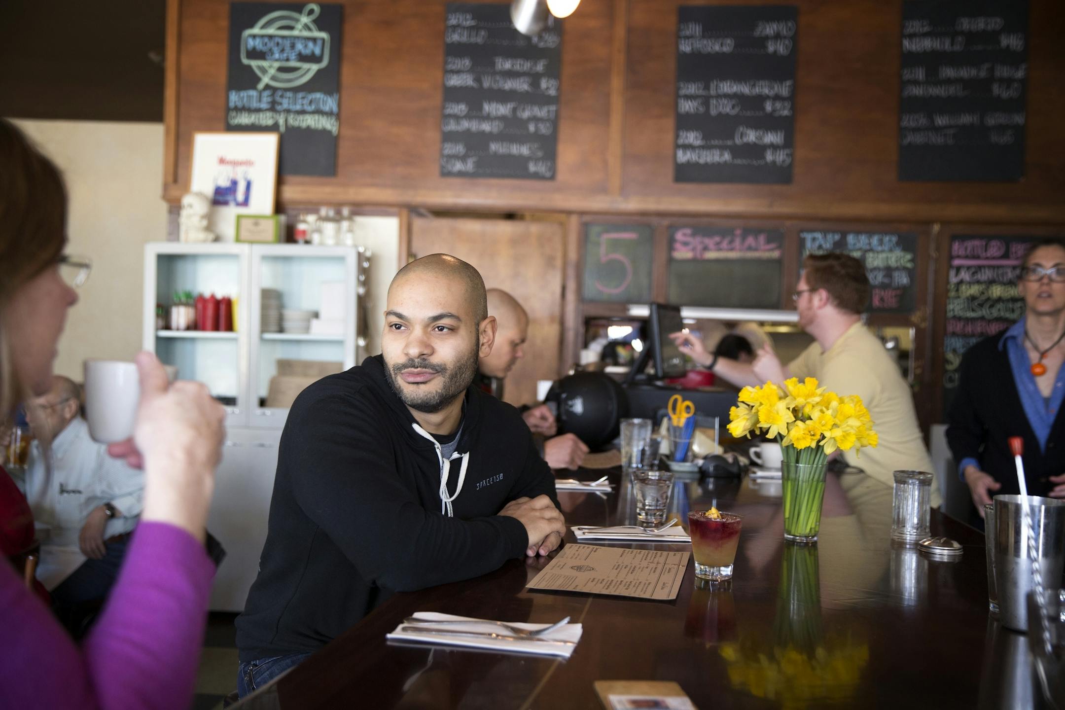 Elliott Payne, a regular for over ten years, eats lunch at the bar in the Modern Cafe in Minneapolis on Tuesday, March 10, 2015.