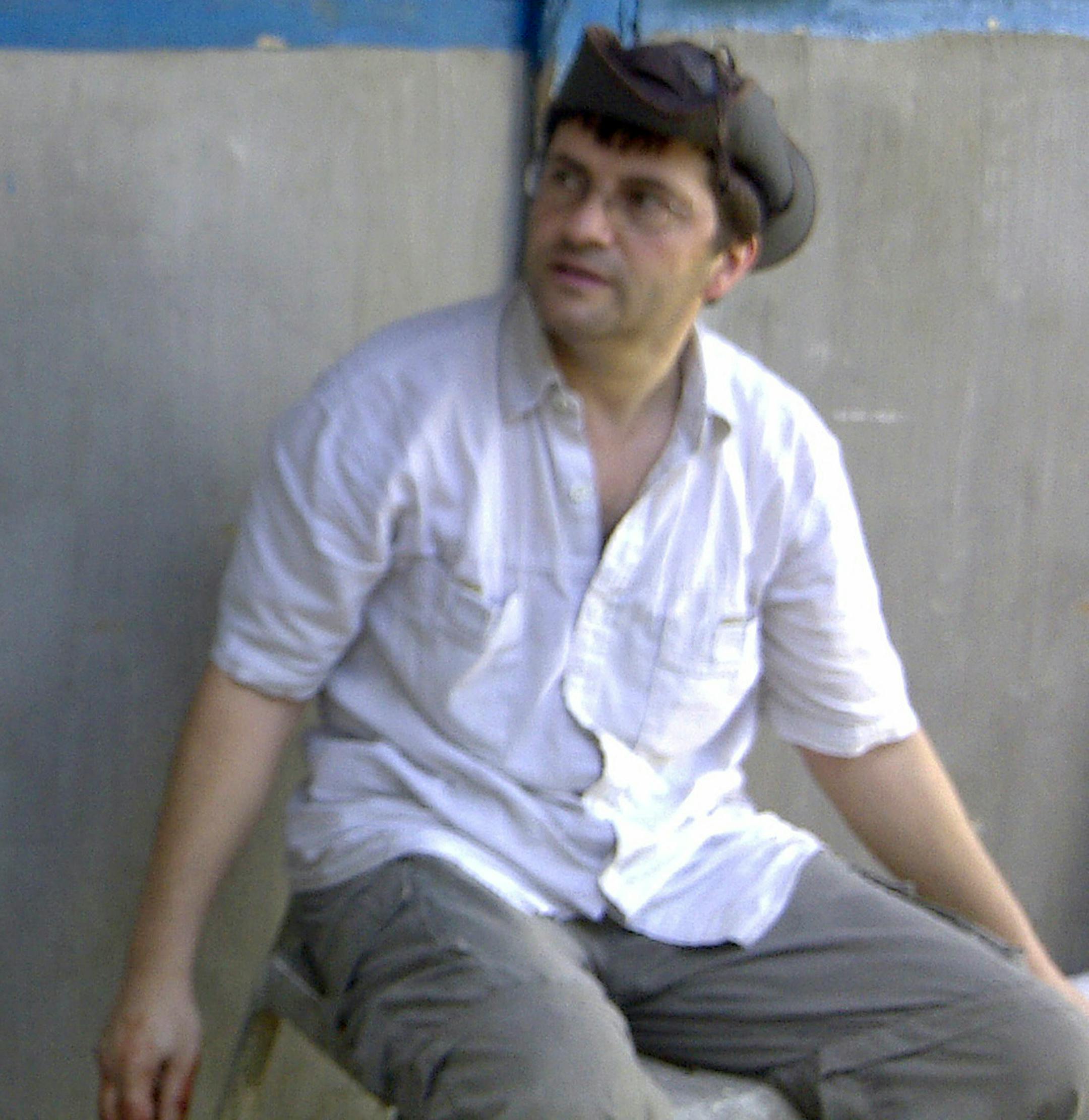 This Jan. 29, 2012 file photo, released by the Tawi-Tawi Provincial Police Office, shows Lorenzo Vinciguerra at an undisclosed place in the southernmost island province of Tawi-Tawi in the Philippines before heading out to a mountain forest to take pictures of the rare Sulu hornbill. Vinciguerra was one of two European bird watchers seized by the militants in nearby Tawi Tawi province in February 2012. The Swiss hostage escaped Saturday.