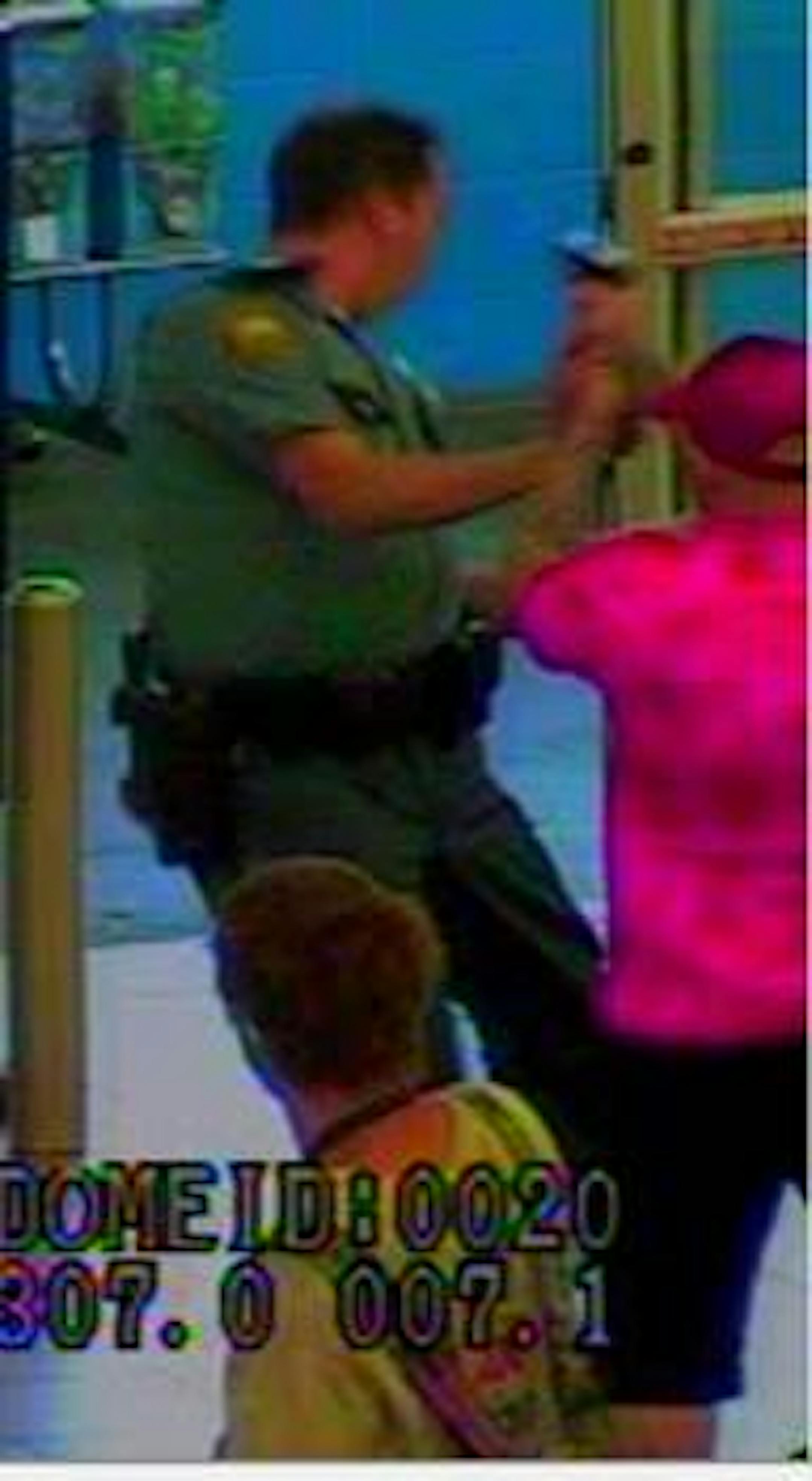 Another scene from surveillance footage at a St. Paul Wal-Mart.