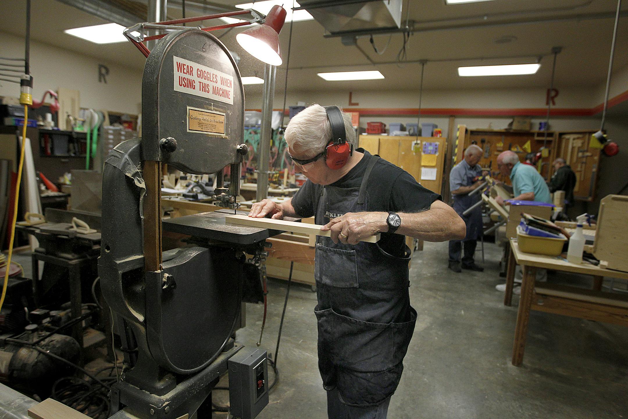 Bob Bonde, 70, is part of a group of volunteer woodworkers who design and build adaptive furniture and other equipment needed by special-needs students.