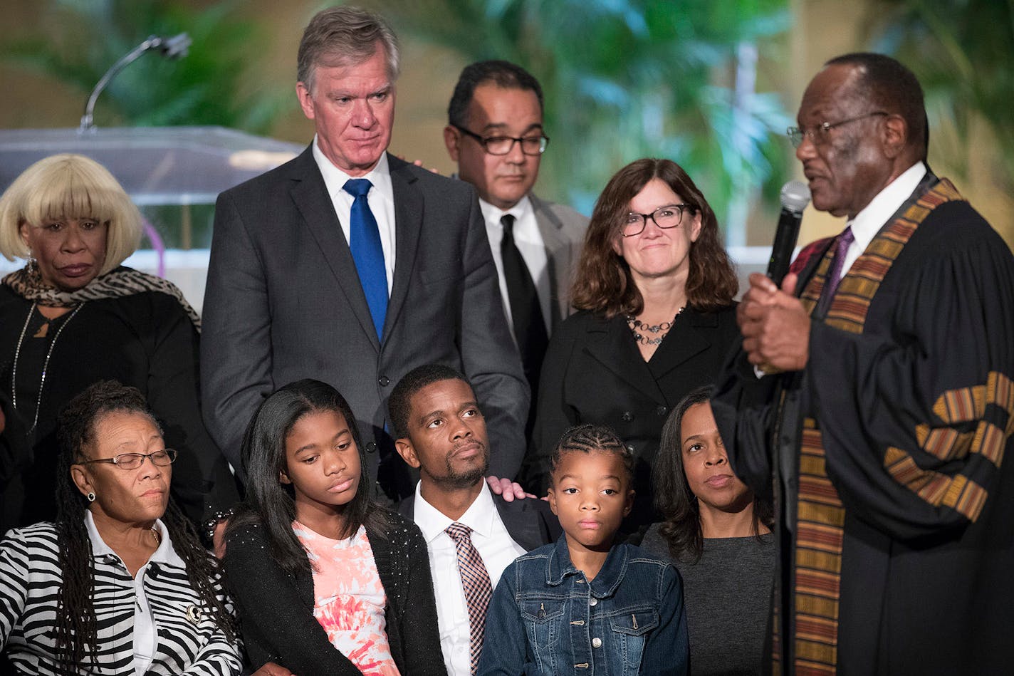 Senior Pastor Dr. Earl Miller right , of Progressive Baptist Church prayed for newly elected St. Paul Mayor Melvin Carter Sunday November, 12, 2017 in St. Paul, MN. Seated left to right family members, Toni Carter, mother, Ramsey County Commissioner, his daughters, Maylena, 11, Naomi, 9 and wife Sakenna. Standing in the back row is former St. Paul Mayor Chris Coleman and his wife Connie Johnson Coleman.