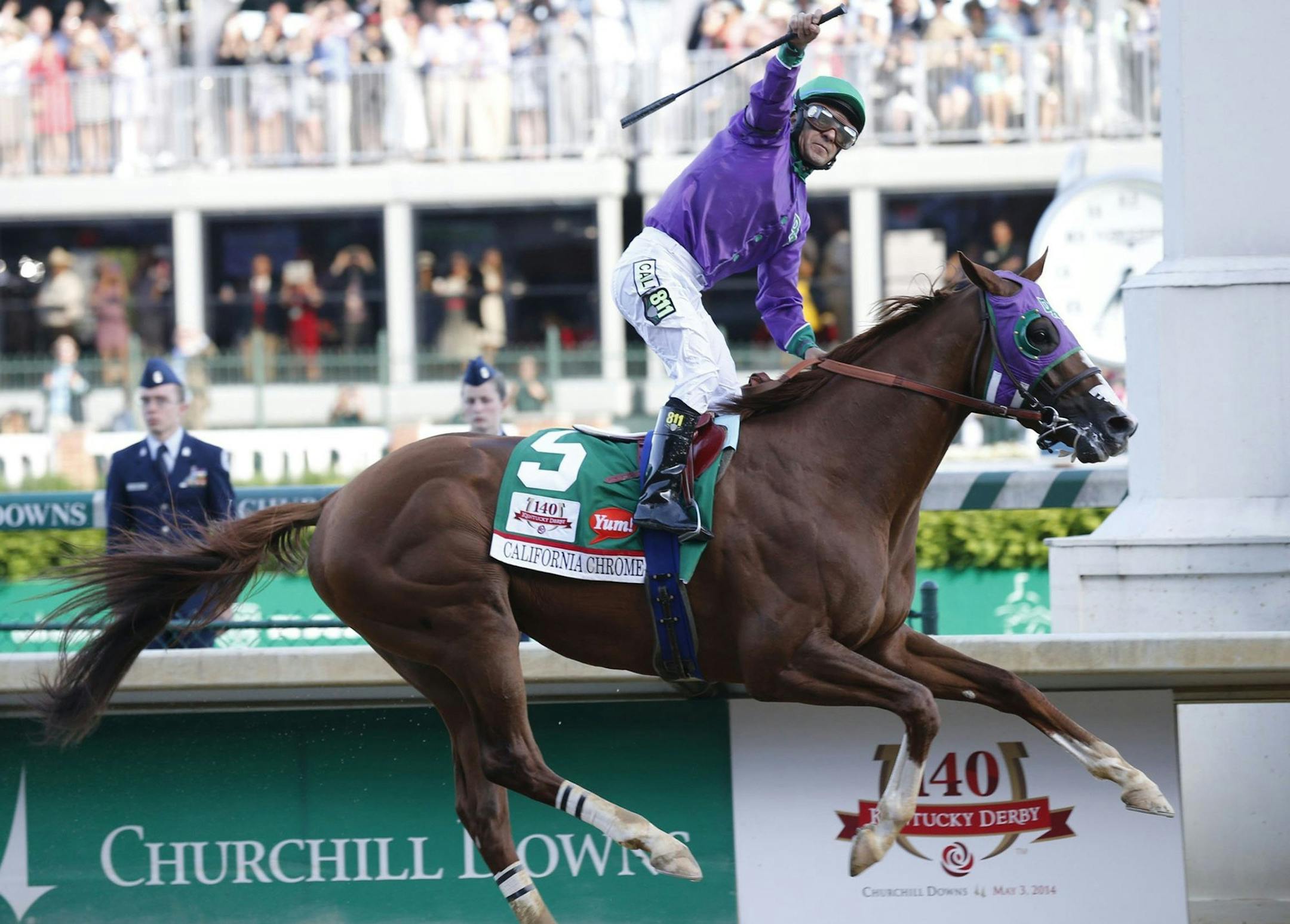 California Chrome with Victor Espinoza up crosses the finish line to win ithe 140th running of the Kentucky Derby at Churchill Downs in Louisville, Ky., Saturday, May 3, 2014. (Ron Garrison/Lexington Herald-Leader/MCT)