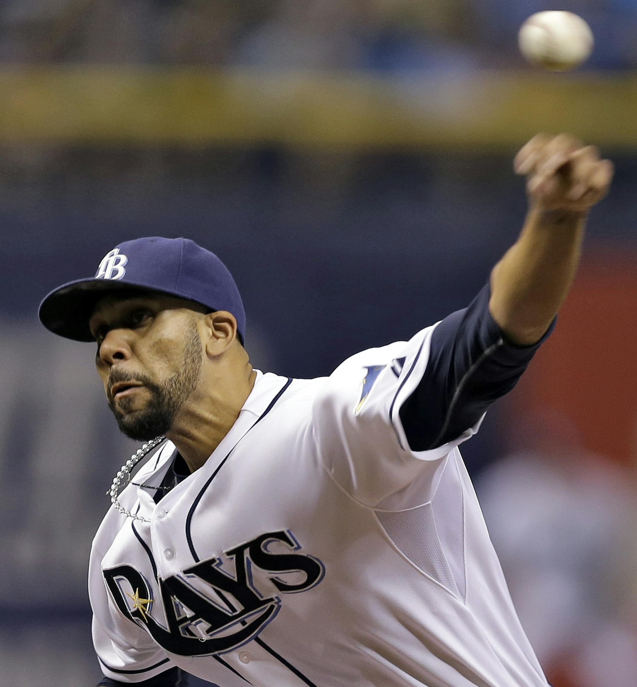 Tampa Bay Rays starting pitcher David Price delivers to New York Yankees' Jacoby Ellsbury (22) during first inning of a baseball game on Thursday, April 17, 2014, in St. Petersburg, Fla. (AP Photo/Chris O'Meara) ORG XMIT: SPD104
