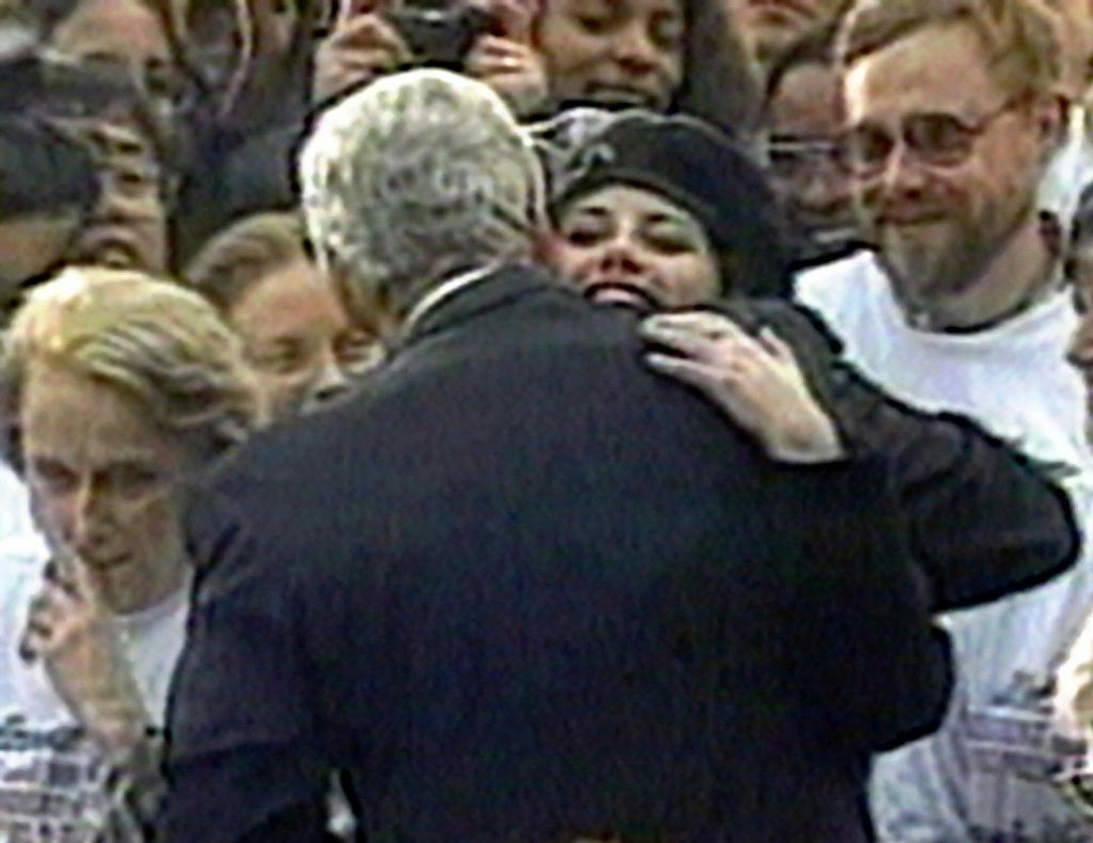 Intern Monica Lewinsky embraced President Clinton as he greeted well-wishers at a White House lawn party in 1996.