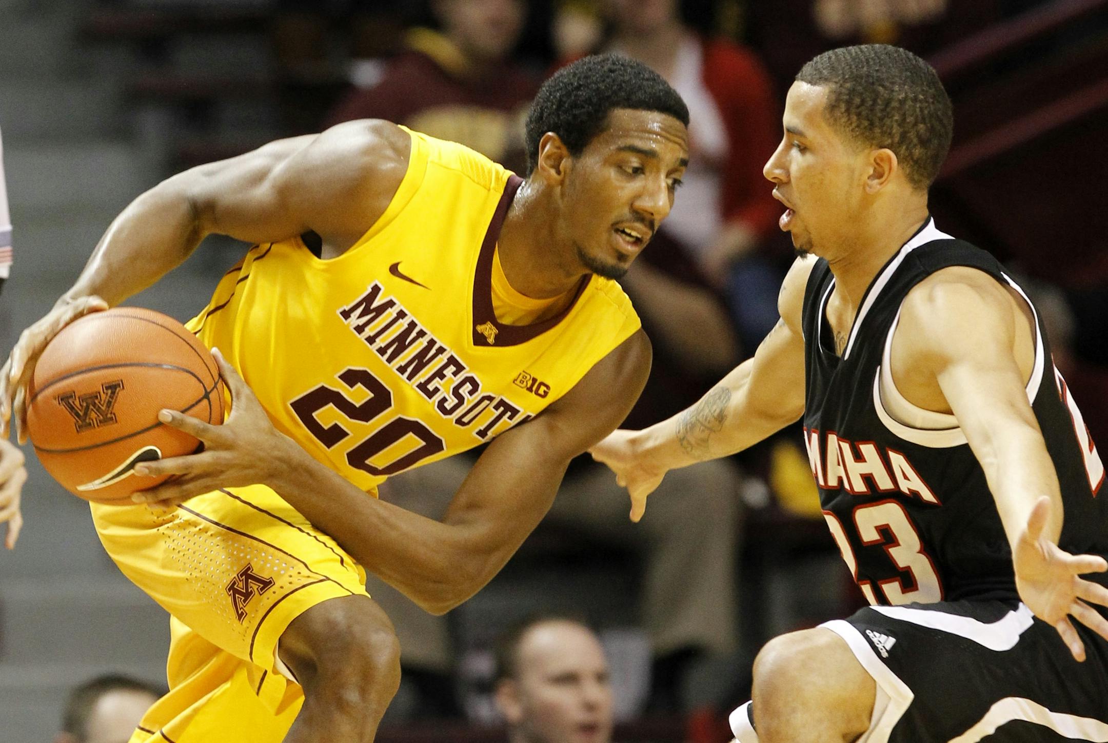 Minnesota guard Austin Hollins (20)