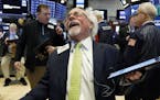Trader Peter Tuchman laughs as he works on the floor of the New York Stock Exchange, Wednesday, March 13, 2019. U.S. stocks opened broadly higher on W
