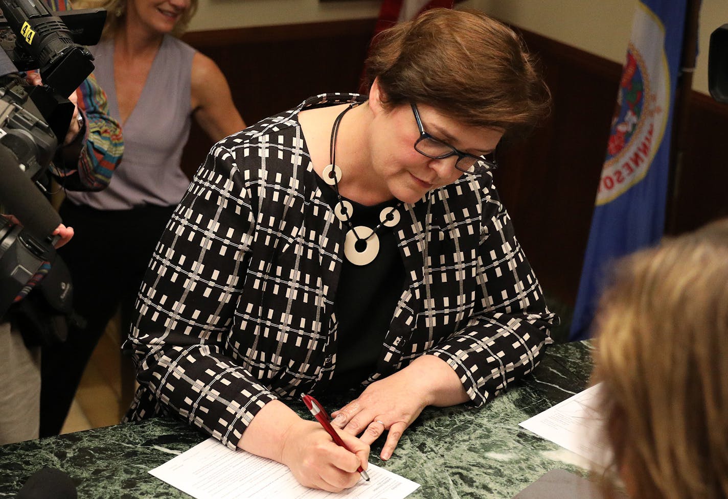 Former House Speaker Margaret Anderson Kelliher filed to run for Keith Ellison&#xed;s congressional seat. ] ANTHONY SOUFFLE &#xef; anthony.souffle@startribune.com Candidates rushed to add their names to the races before the 5 p.m. Tuesday, June 5, 2018 deadline for filing to Minnesota's August primary ballot at the Minnesota Secretary of State's Office in St. Paul, Minn. With Lori Swanson out of AG and into governor's race, there could yet be more big last entries to some of the top races.