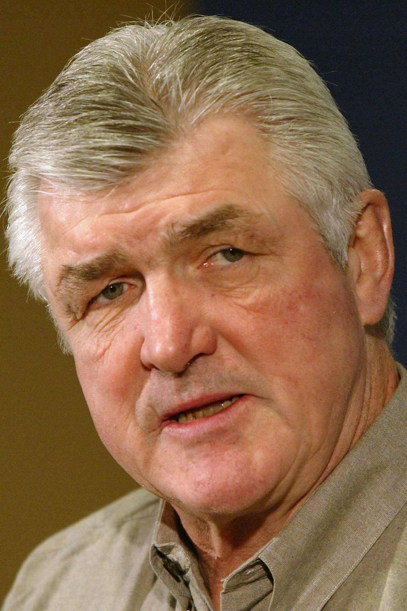 FILE - This April 19, 2004, file photo shows Toronto Maple Leafs head coach Pat Quinn answering questions following an optional skate in Toronto. Former NHL player, coach and executive Pat Quinn died Sunday night, Nov. 23, 2014, in Vancouver. He was 71. (AP Photo/The Canadian Press, Frank Gunn, File)