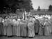 FILE - In this June 22, 1939 file photo, participants in a "Gorsedd," a group of poets and bards, announce the upcoming 1940 Welsh Eisteddfod cultural