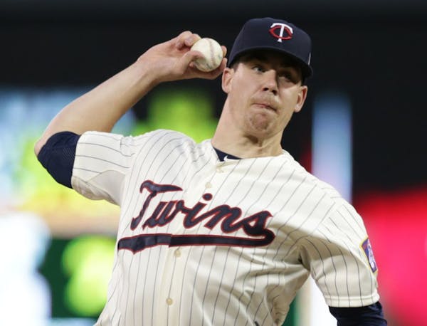 Minnesota Twins pitcher Trevor May throws against the Cleveland Indians in the first inning of a baseball game, Saturday, Sept. 20, 2014, in Minneapol