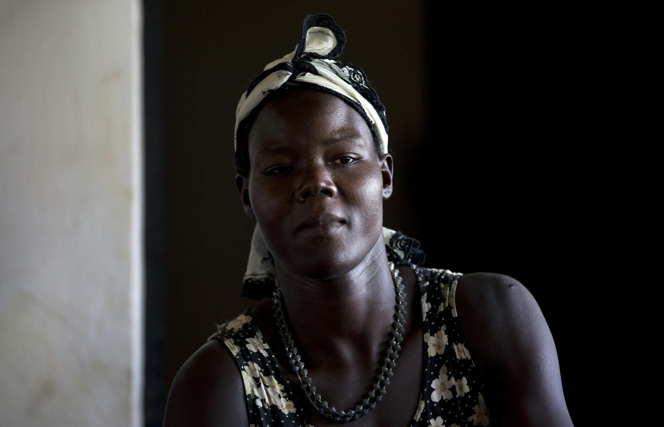 In this photo taken Friday, April 27, 2012, Adye Sunday, 25, who was abducted when she was 13 by Lord's Resistance Army (LRA) leader Joseph Kony and forced to be one of his dozens of "wives" and says he's also the father of her two children, prepares food to sell at a center set up to help those who have left or fled the LRA, in Gulu, Uganda. Adye Sunday isn't sure about the calls to kill or capture LRA leader Joseph Kony, who inspires conflicted thoughts among some people in northern Uganda, de