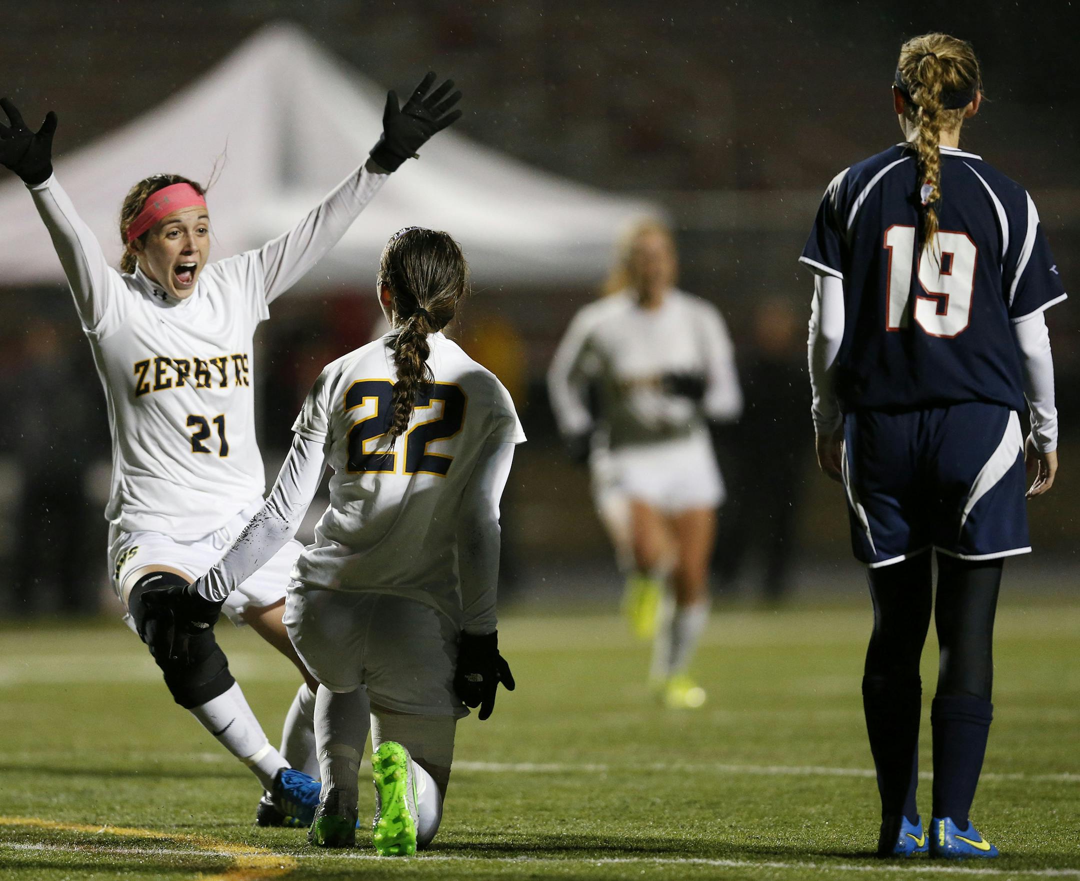 Karleen Yapello (21) ran to congratulate Michelle Austin (22) after Austin scored a goal in the second overtime to beat St. Peter 1-0. ] CARLOS GONZALEZ ï cgonzalez@startribune.com - October 27, 2015, Farmington, MN, High School / Prep, Class 1A girls soccer state quarterfinals, Mahtomedi v. St. Peter
