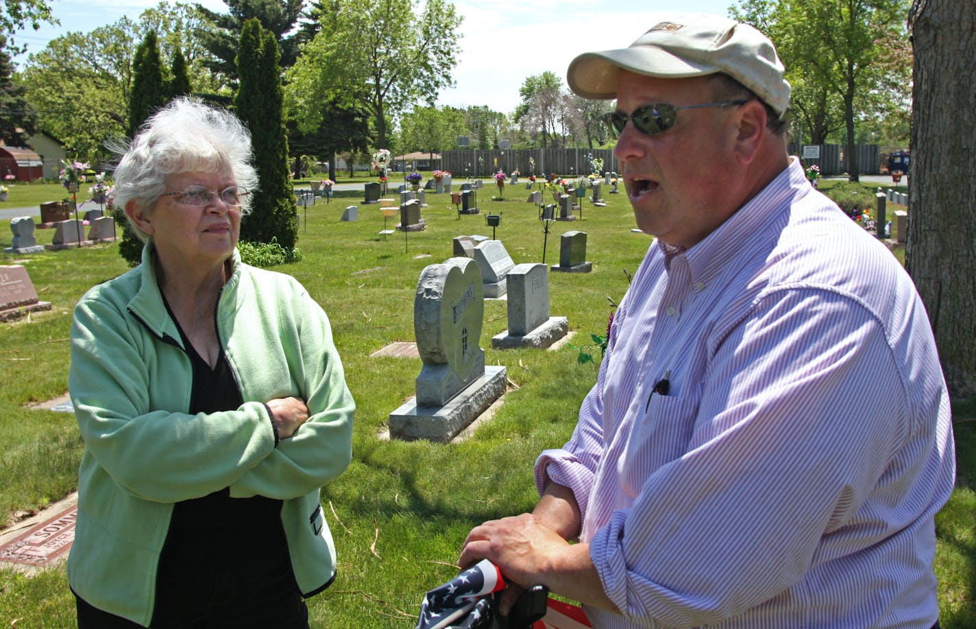 Myrna Kragness and Mound Cemetery manager Dan Kantar discussed the problem of people who steal flowers and plants from graves. Often, the stolen items are found elsewhere in the same cemetery.