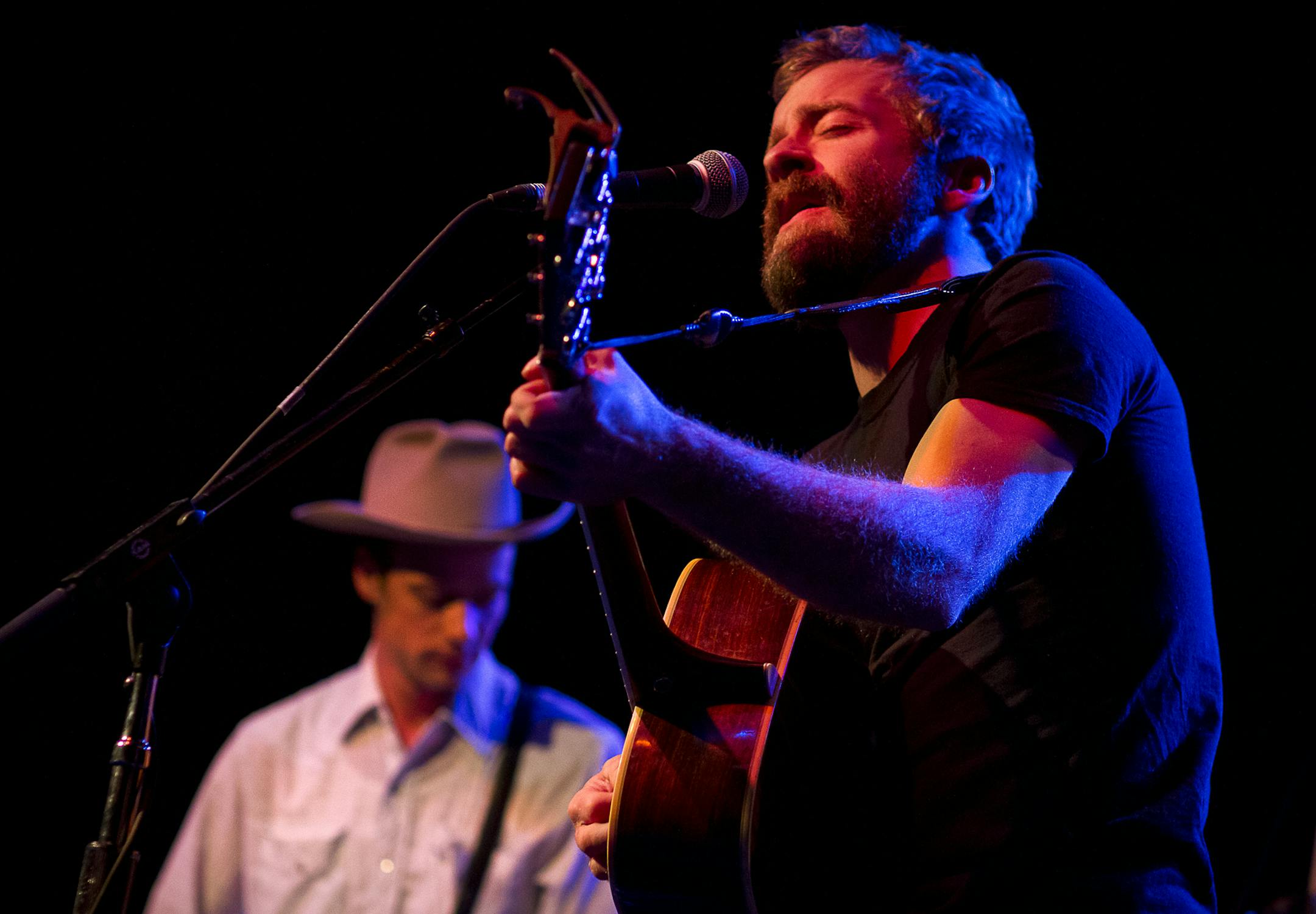 Lead singer of Trampled By Turtles, Dave Simonett, right, performs during Minneapolis Mayor R.T. Rybak's "Unauguration Party" at First Avenue, Wednesday, December 18, 2013.