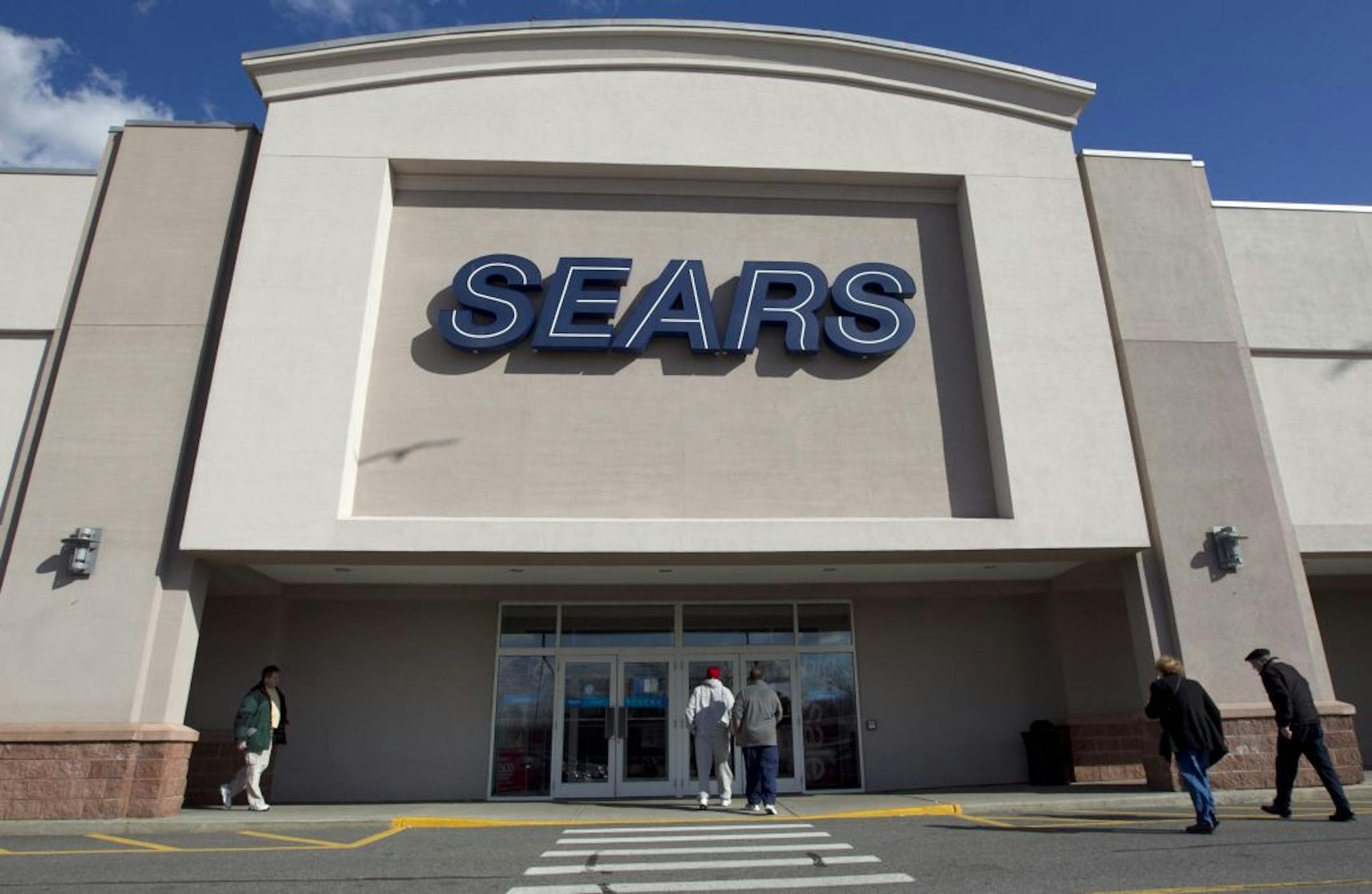 A Sears store in Dedham, Mass. Sears Holdings Corp. said it will spin off its smaller stores, and sell 11 of its mall stores in deals expected to raise as much as $770 million as it seeks to regain profitability and market share.