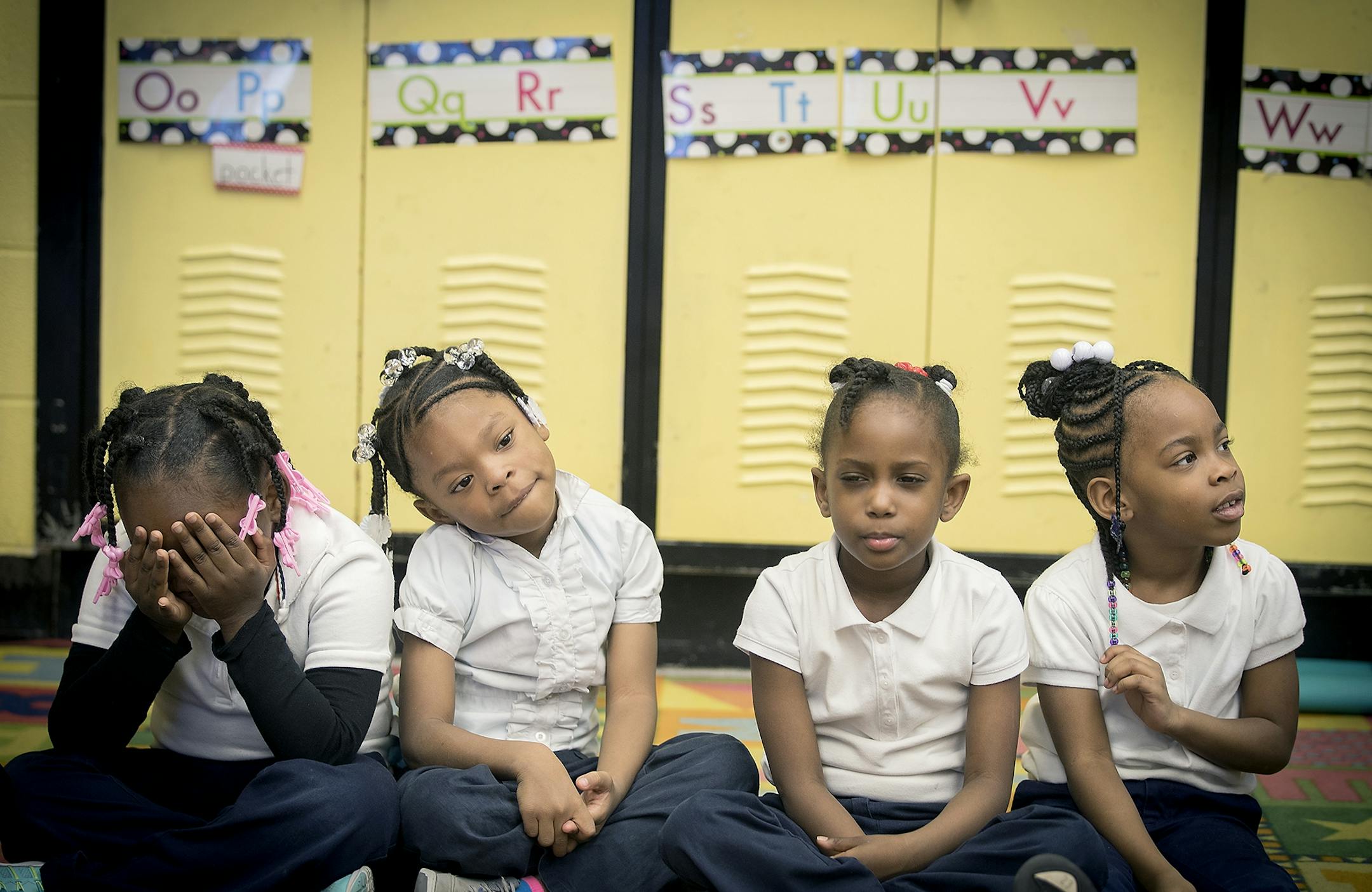 Pre-kindergarten students listen to their teacher Priscilla Horton as she gave a lesson on the topic of sharing at Marcus Garvey Elementary School, Tuesday, March 21, 2017 in Chicago, IL.