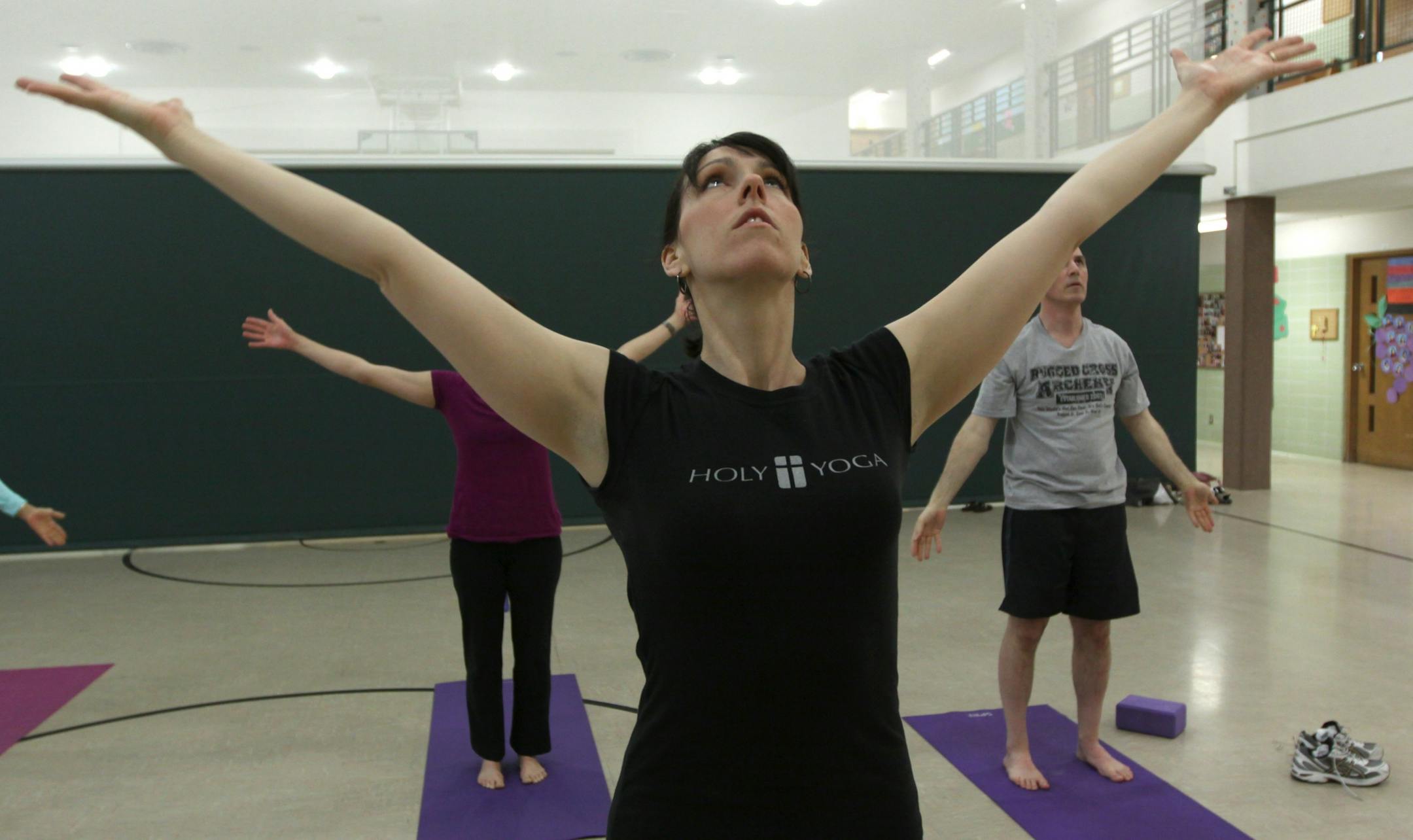 Jonnie Goodmanson led her class in exercises during the Holy Yoga class at the Elim Lutheran Church in Robbinsdale.