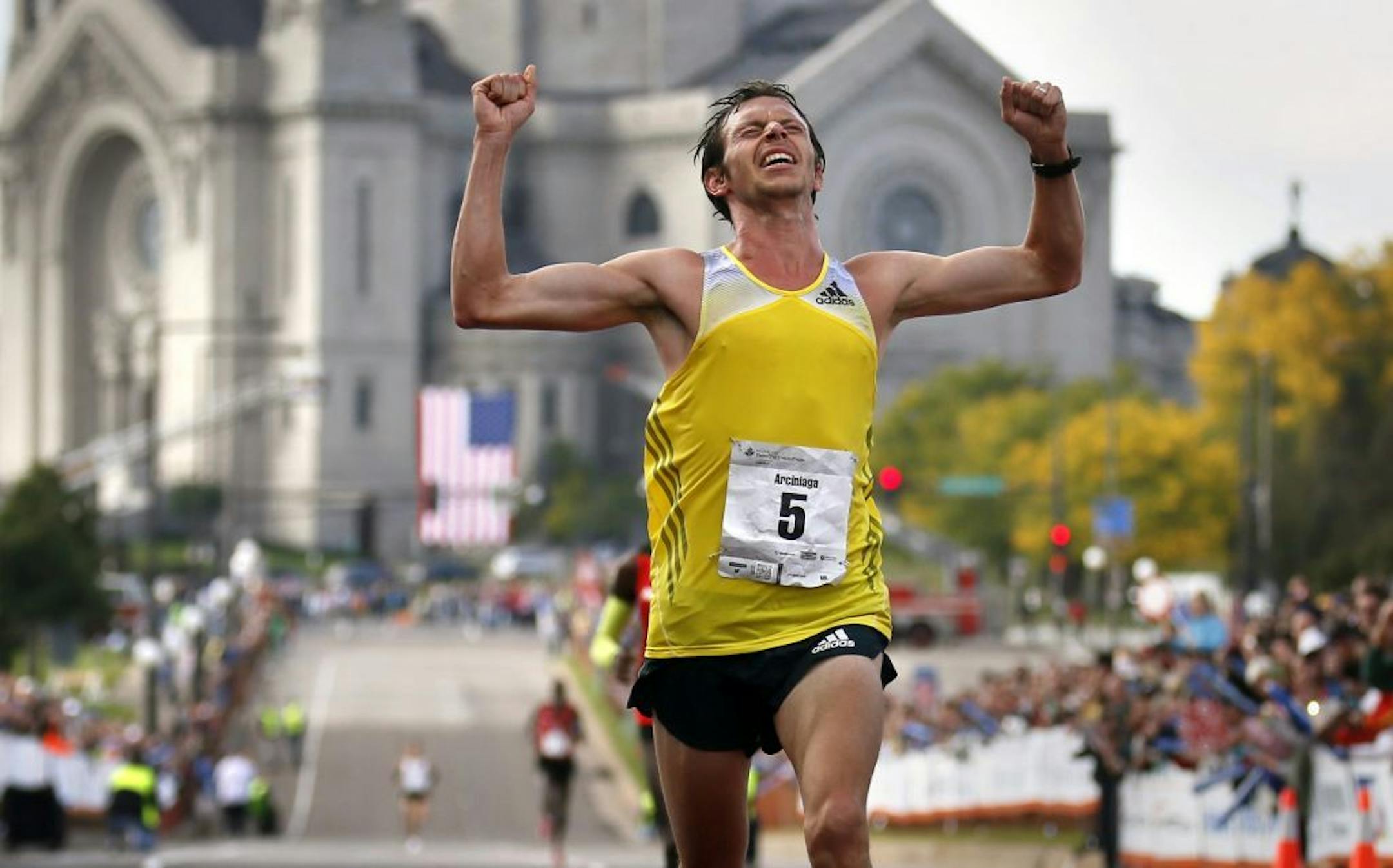 Nick Arciniaga's 13th marathon turned out to be the luckiest of his career, as he won the Twin Cities Marathon Sunday morning to earn his first victory at the 26.2-mile distance.