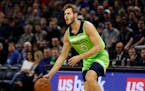Minnesota Timberwolves forward Jake Layman dribbles against the Houston Rockets in the third quarter of a basketball game Saturday, Nov. 16, 2019 in M