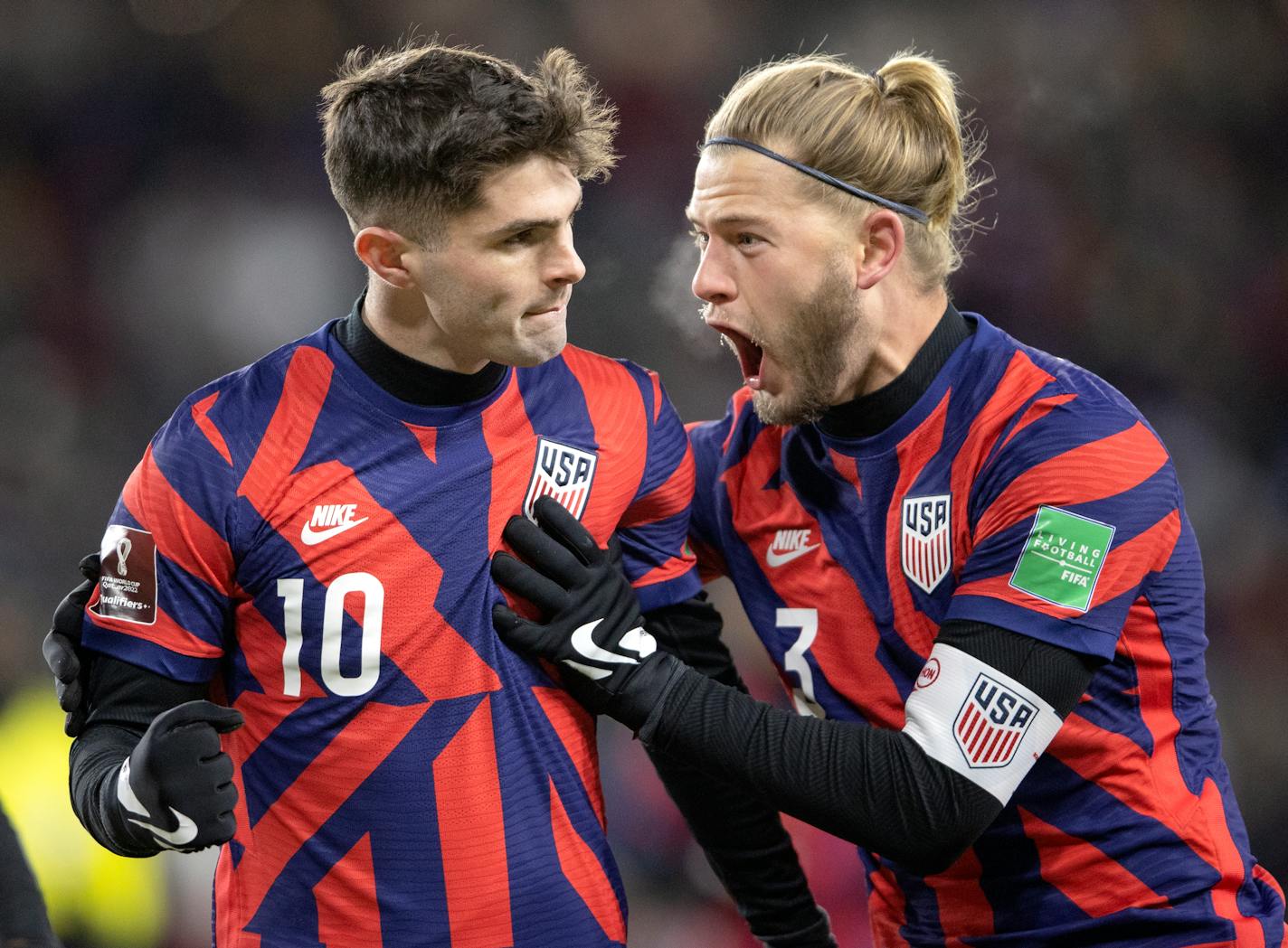 Christian Pulisic (10) and Walker Zimmerman (3) of the U.S.A. celebrate a goal by Pulisic in the second half Wednesday, Feb. 2, at Allianz Field in Saint Paul, Minn.