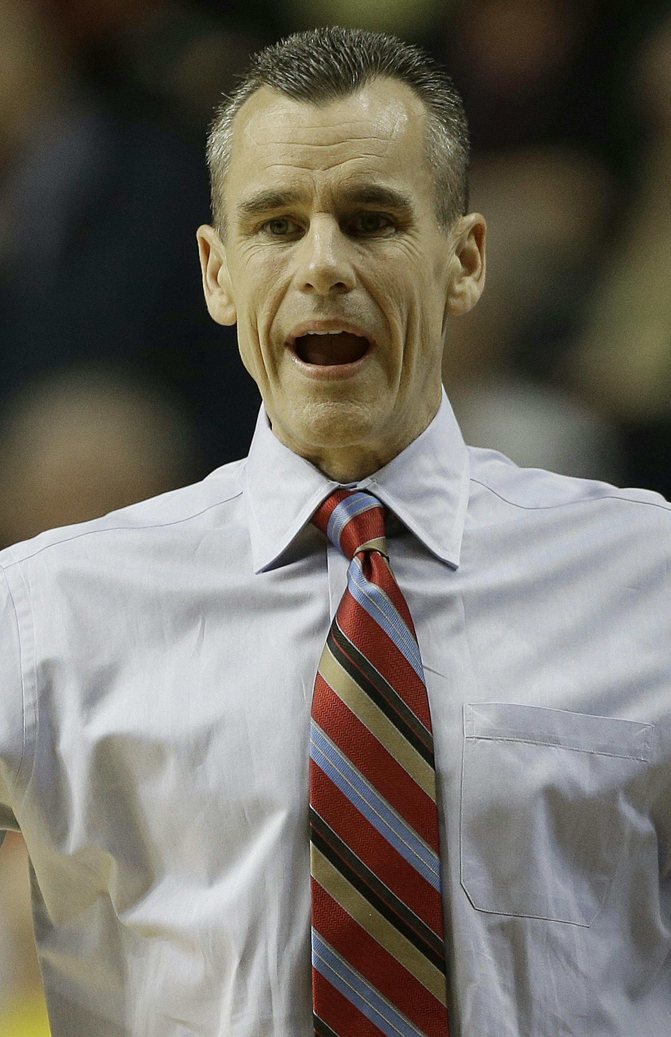 Florida head coach Billy Donovan reacts to play against Mississippi during the first half of an NCAA college basketball game in the final round of the Southeastern Conference tournament, Sunday, March 17, 2013, in Nashville, Tenn. (AP Photo/Dave Martin)