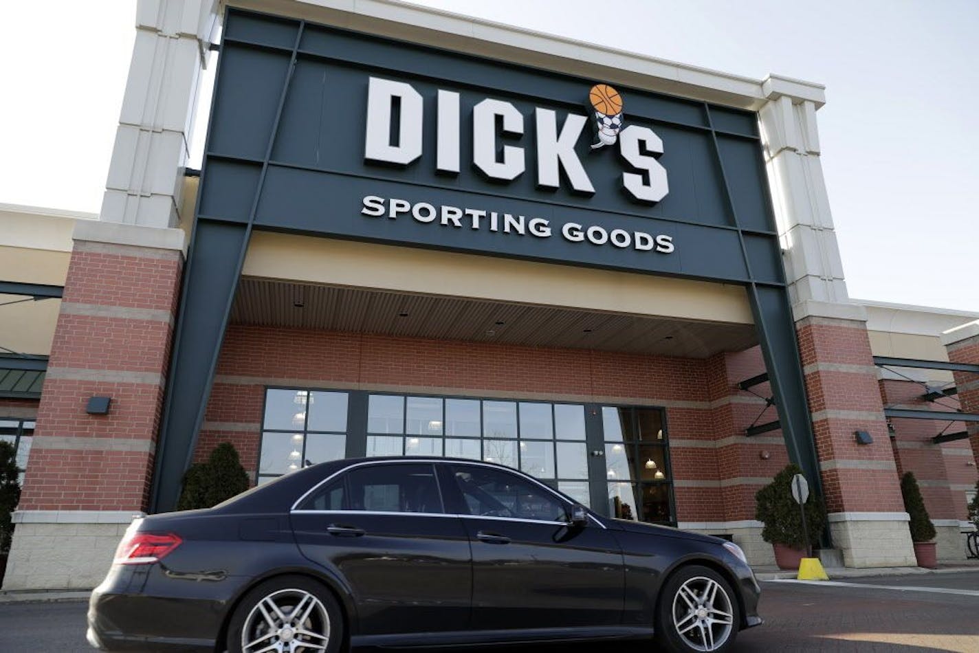 A Dick's Sporting Goods store is seen in Arlington Heights, Ill., Wednesday, Feb. 28, 2018. Dick's Sporting Goods announced Wednesday that it will immediately end sales of assault-style rifles and high capacity magazines at all of its stores and ban the sale of all guns to anyone under 21. Dick's had cut off sales of assault-style weapons at Dick's stores following the Sandy Hook school shooting. But Dick's owns dozens of its Field & Stream stores, where there has been no such ban in place.