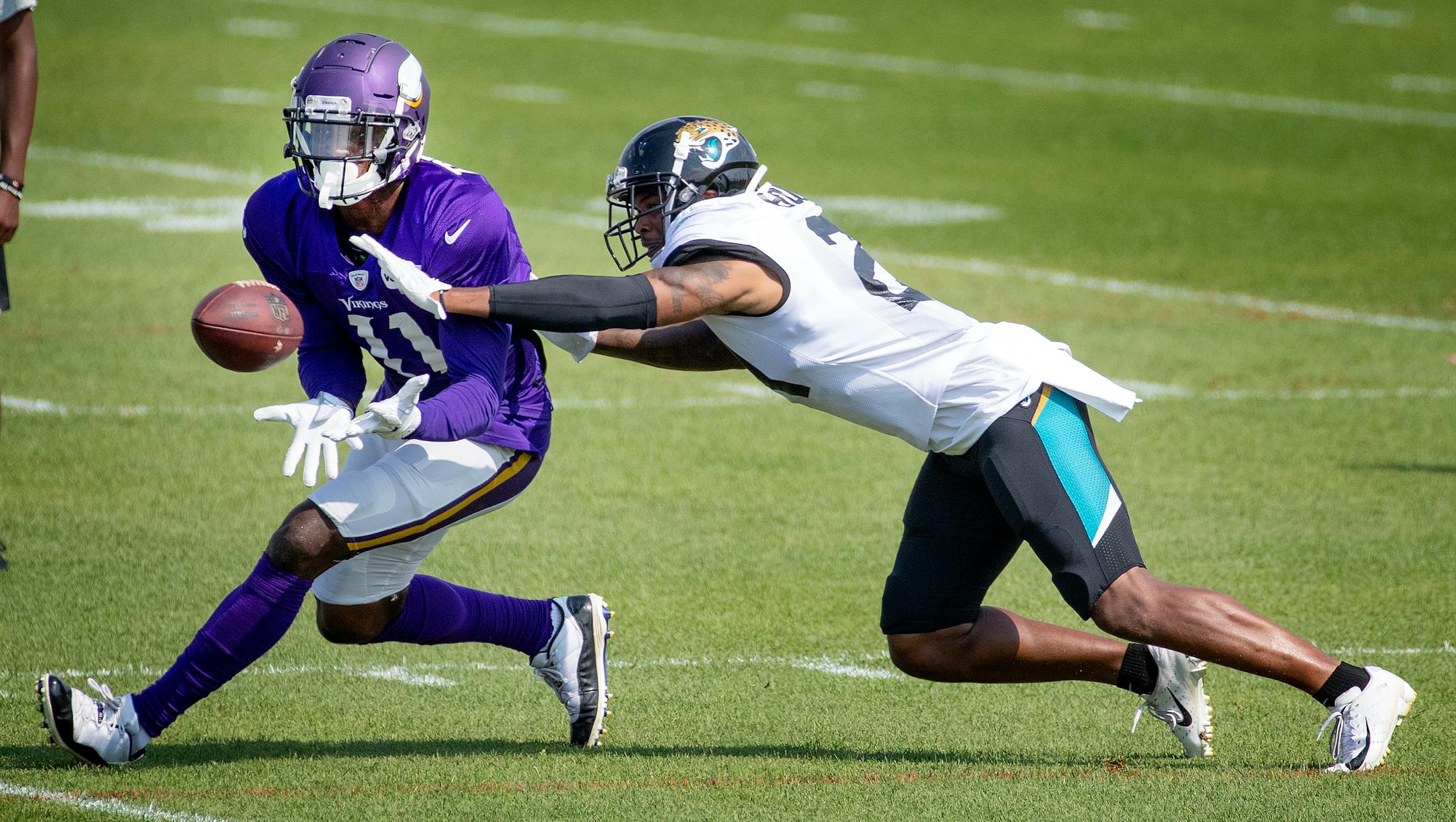 Vikings wide receiver Laquon Treadwell is covered by the Jaguars' A.J. Bouye on Wednesday in Eagan during the teams' joint practice.