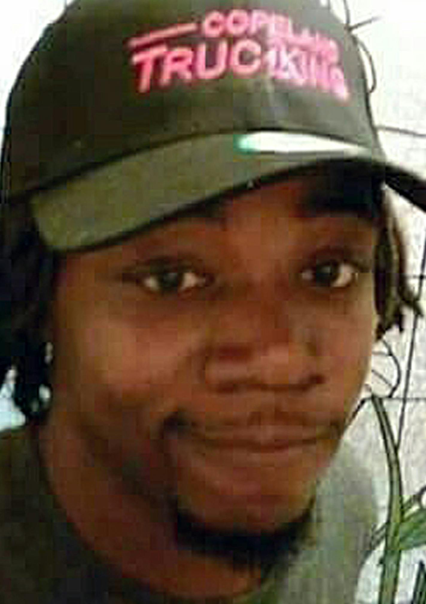 This undated photo released by his sister Javille Burns shows Jamar Clark, who was fatally shot in a confrontation with police on Sunday, Nov. 15, 2015, in Minneapolis. The state's Bureau of Criminal Apprehension on Wednesday, Nov. 18, which is leading an outside investigation of Sunday's fatal shooting of the unarmed black man, released the names of two Minneapolis police officers involved as Mark Ringgenberg and Dustin Schwarze. (Jamar Clark/Javille Burns via AP) ORG XMIT: MIN2015111817575376