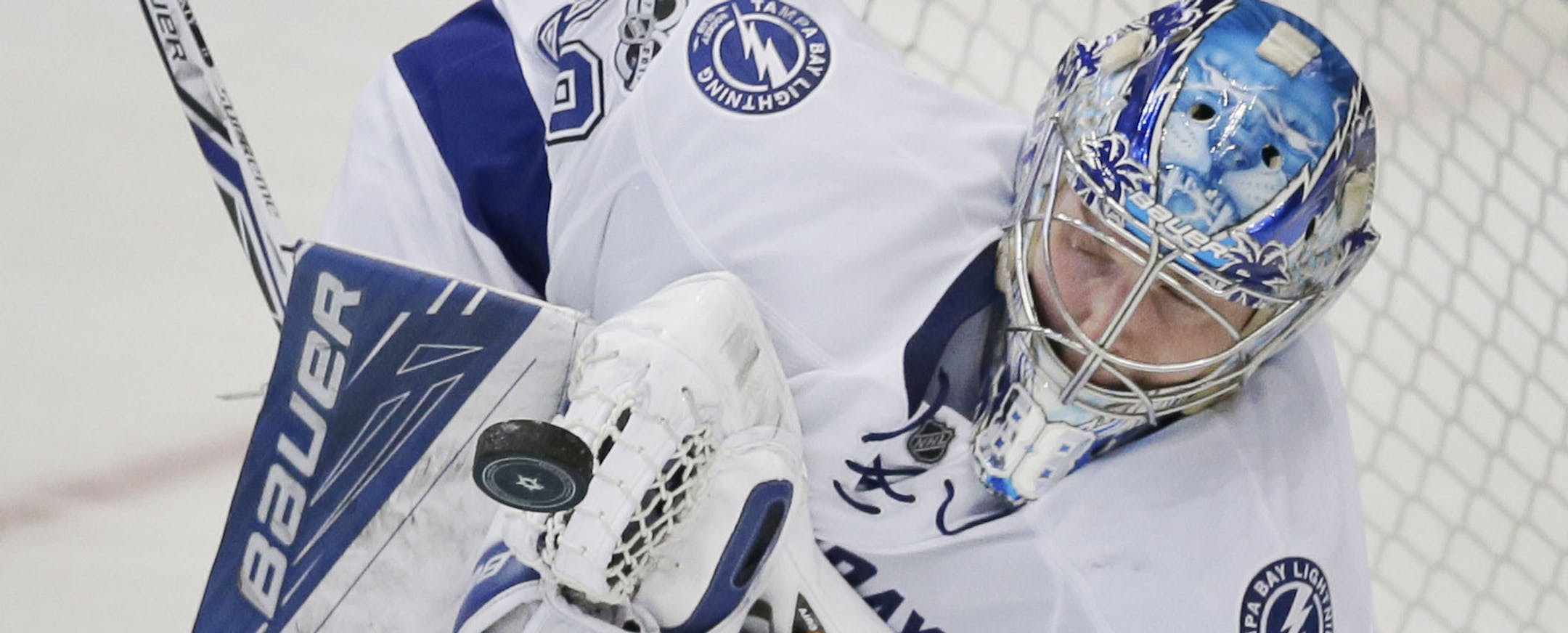 Tampa Bay Lightning goalie Andrei Vasilevskiy (88) blocks a shot during the second period of an NHL hockey game against the Dallas Stars in Dallas, Saturday, Feb. 18, 2017. (AP Photo/LM Otero) ORG XMIT: MIN2017030816545831