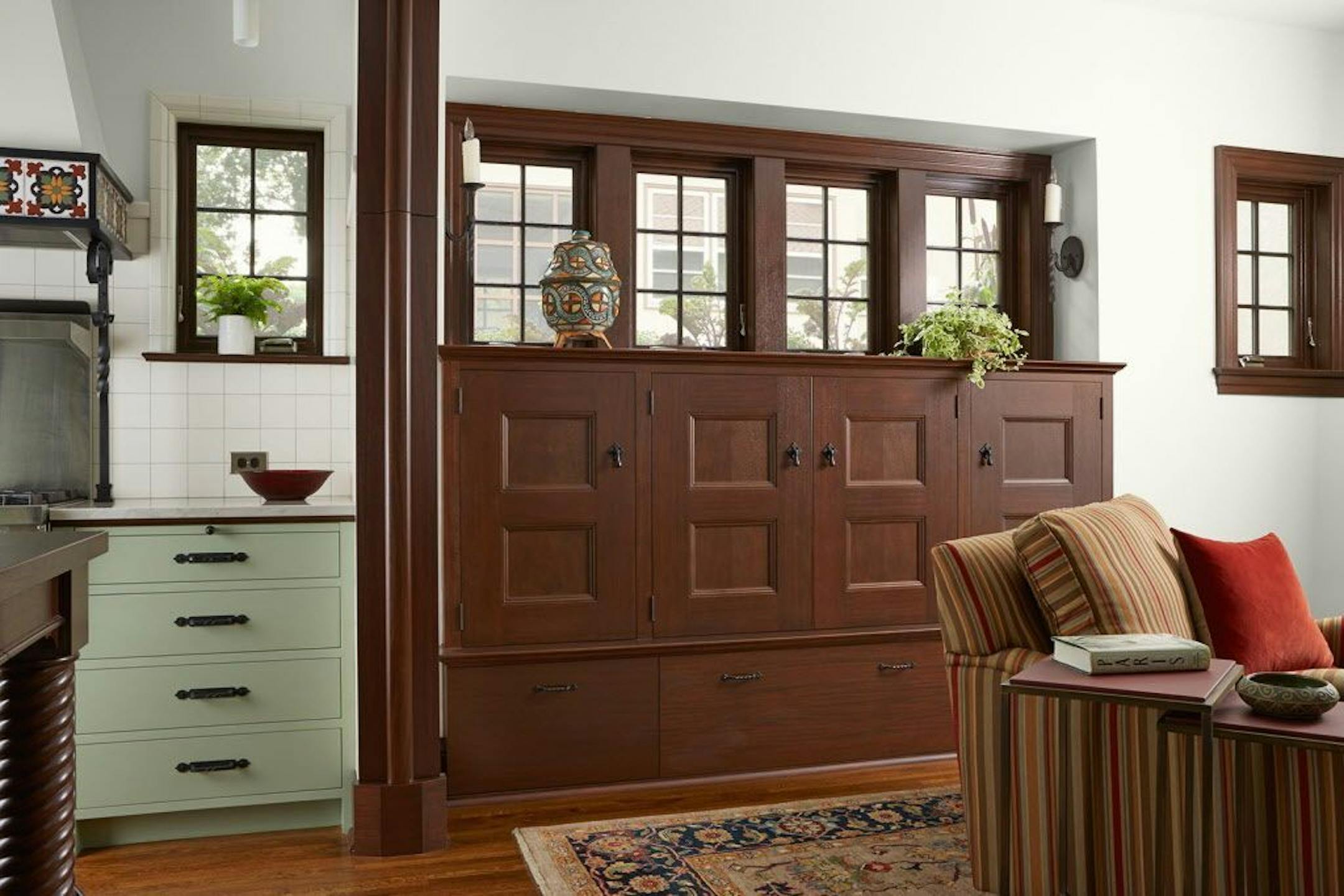 The kitchen is open to a new family room with mahogany trim and built-ins.