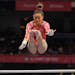 Suni Lee competes at the Olympic trials last month. 