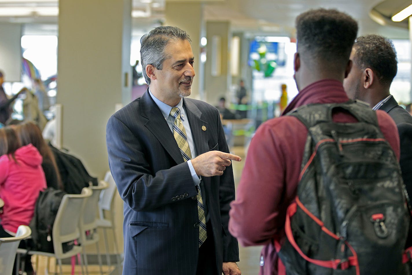 St. Paul College President Rassoul Dastmozd, an Iranian native who took the school's helm three years ago, walked the building to greet some of the students Tuesday, October 7, 2014 in St. Paul, MN. ] (ELIZABETH FLORES/STAR TRIBUNE) ELIZABETH FLORES &#xa5; eflores@startribune.com