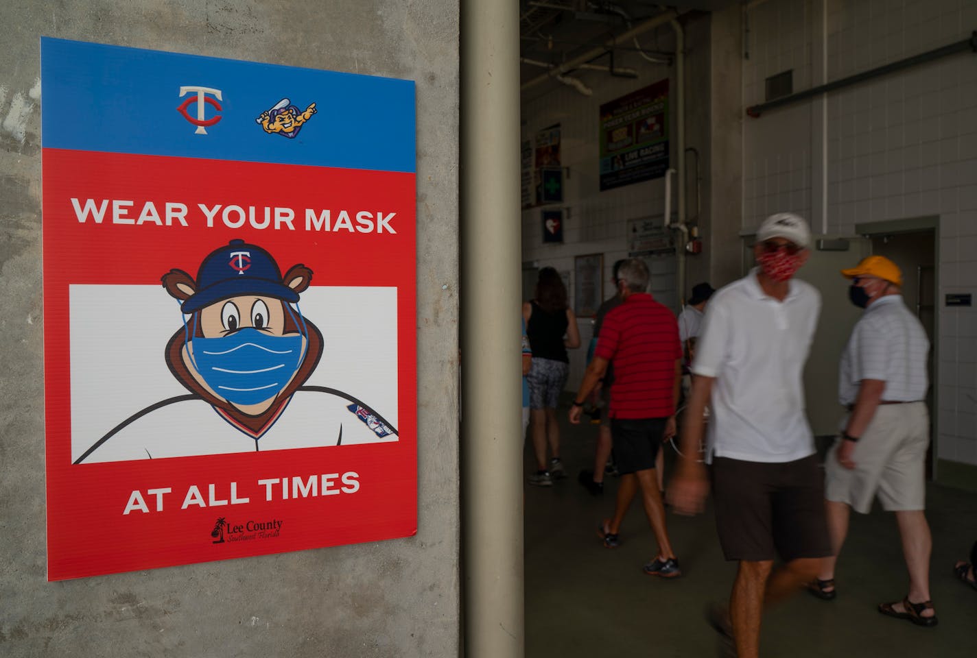 TC Bear signage encouraged fans to keep their masks on. Most people complied. ] JEFF WHEELER • jeff.wheeler@startribune.com