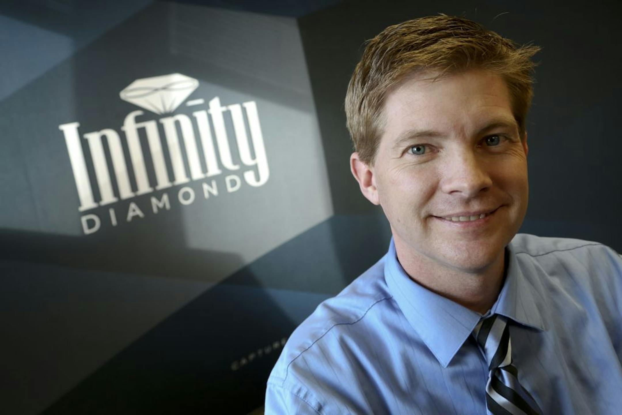 Scott Shaffer, of Infinity Diamond, at his distribution office in Andover, Min., Tuesday November 27, 2012. The company uses organic material to make the diamonds.