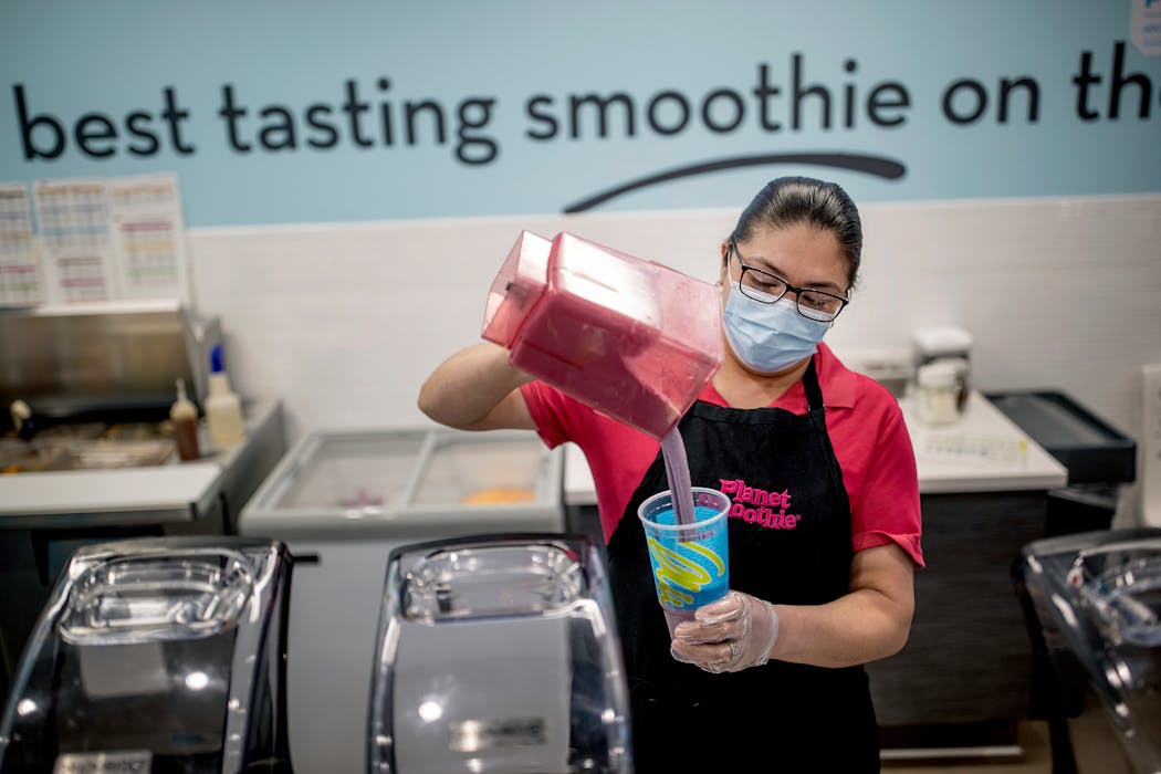 Planet Smoothie franchise owner Maricela Gallarzo made smoothies in 2022 at her downtown Gaviidae Common shop. 