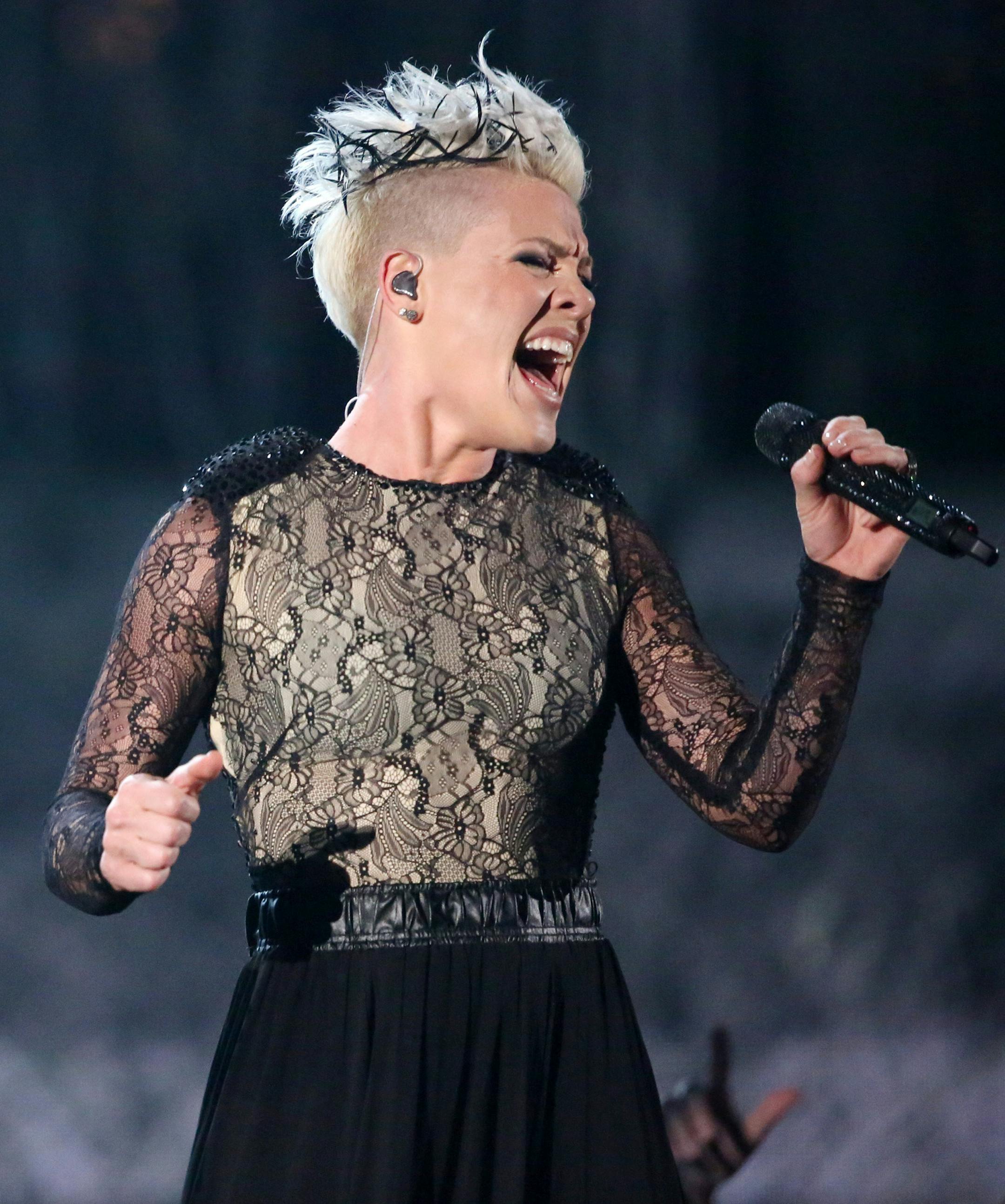 Nate Ruess, left, and Pink perform "Just Give Me a Reason" at the 56th annual Grammy Awards at Staples Center on Sunday, Jan. 26, 2014, in Los Angeles. (Photo by Matt Sayles/Invision/AP)