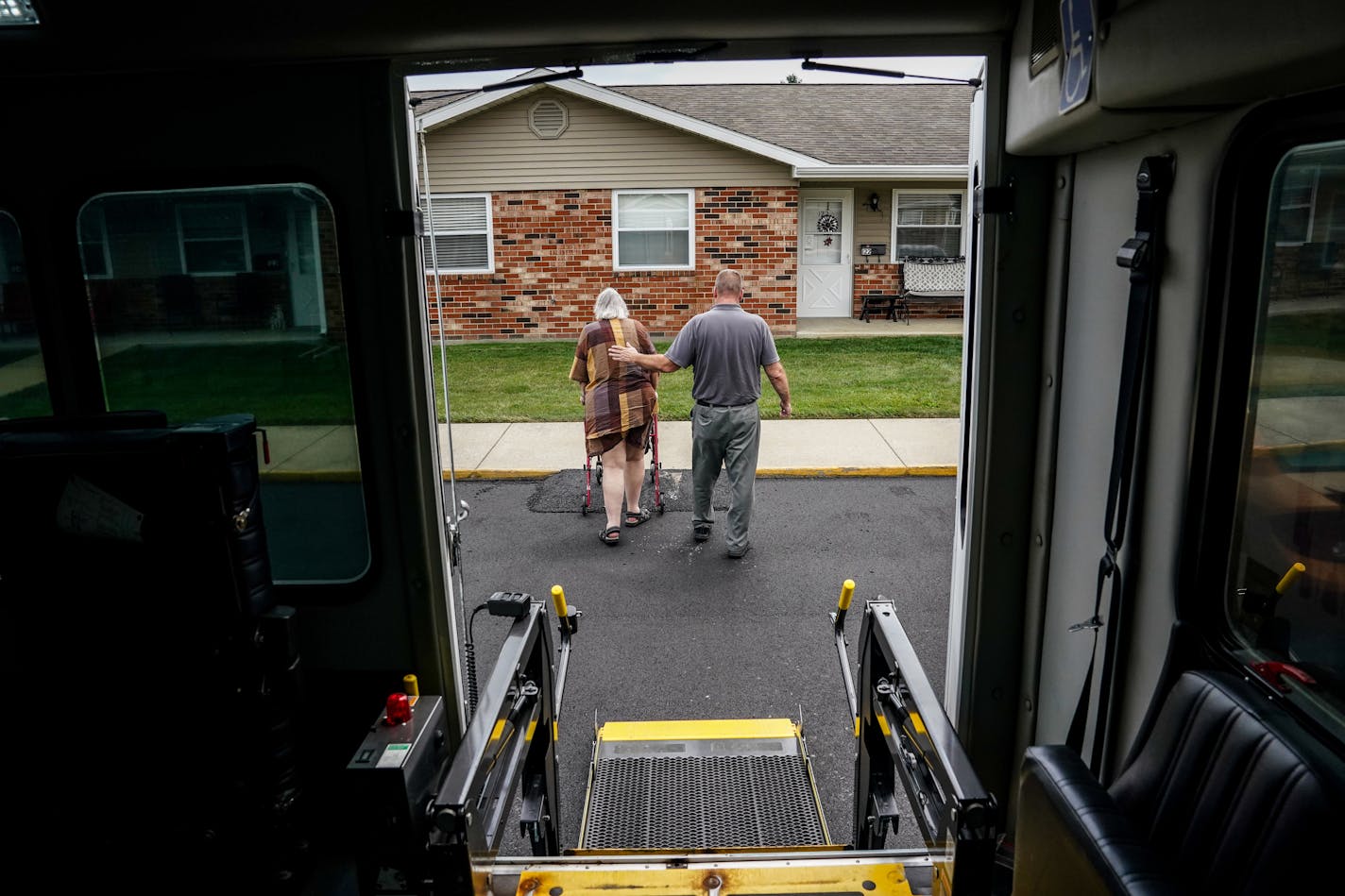 Scott Chasteen, transportation services coordinator for Decatur County Memorial Hospital, transports patient Marilyn Loyd, 70, to her home in rural Greensburg, Ind., in July. Forty years ago, many small towns and rural regions were healthier for adults in the prime of life. MUST CREDIT: Washington Post photo by Jahi Chikwendiu