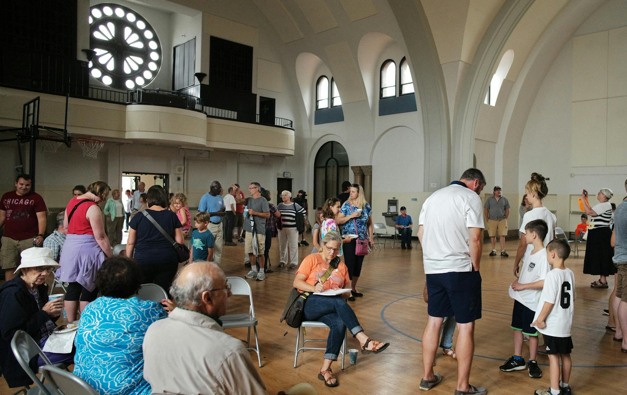The former St. Andrews Church has Romanesque features and other architectural details cherished by preservationists. The Twin Cities German Immersion School held an open house Sunday to allow people to say goodbye to the former St. Andrew's Church. Opponents of the school's plans to demolish the old church gave up the legal fight but showed up to make final public stand.