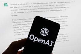 The OpenAI logo is seen on a mobile phone in front of a computer screen displaying output from ChatGPT, March 21, 2023, in Boston. The Center for Inve