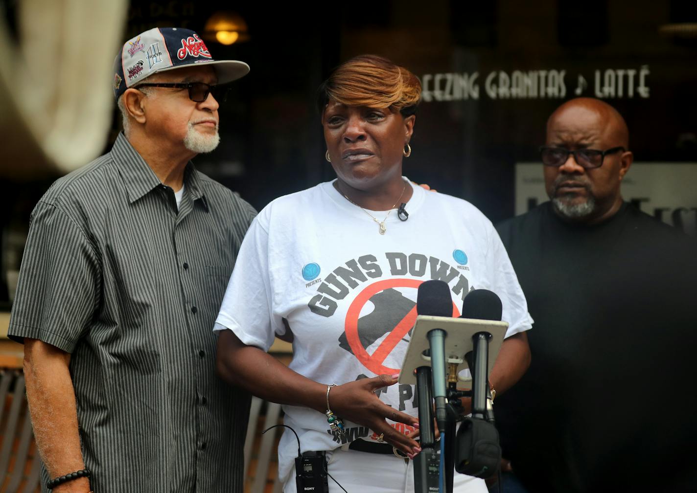 St. Paul community leaders gathered outside Golden Thyme Coffee and Cafe to announce a call to action about the recent rash of homicides in St. Paul, including three in a 12 hour period Tuesday, Sept. 10, 2019, in St. Paul, MN. Here, Dora Jones-Robinson, executive director of Mentoring Young Adults, who lost a niece to gun violence, got emotional while speaking at the press conference flanked by Nathaniel Khaliq, retired St. Paul NAACP president, left, and Rev. Darryl Spence of the God Squad.] D