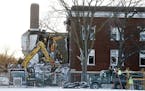 Construction crews begin demolition of the Minnehaha Academy campus damaged by a natural gas explosion. Over the next, two weeks, will be working to r