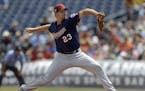 Minnesota Twins pitcher Nick Tepesch delivers to the Philadelphia Phillies during the first inning of a spring training baseball game Thursday, March 